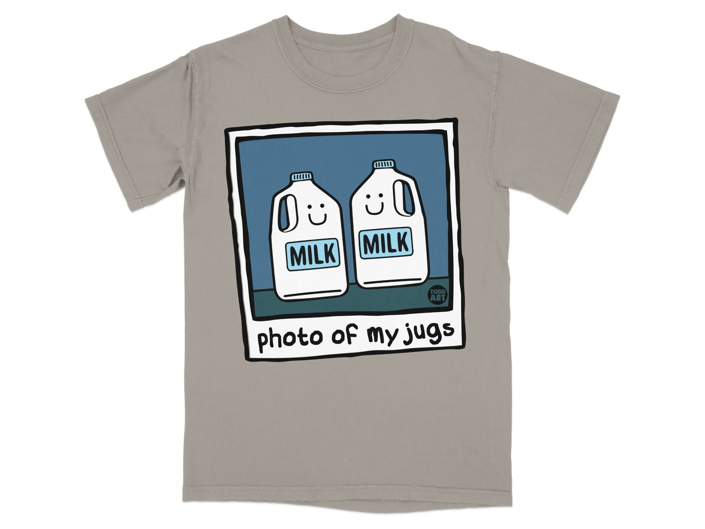 Two cartoon milk jugs with smiling faces on a t-shirt.