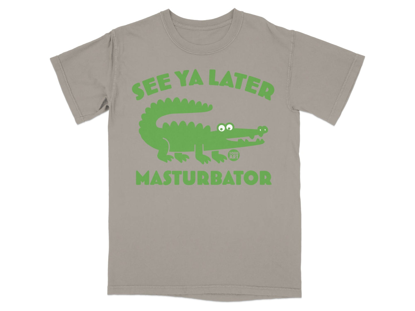 Green alligator graphic with text "SEE YA LATER MASTURBATOR" on a tan t-shirt.