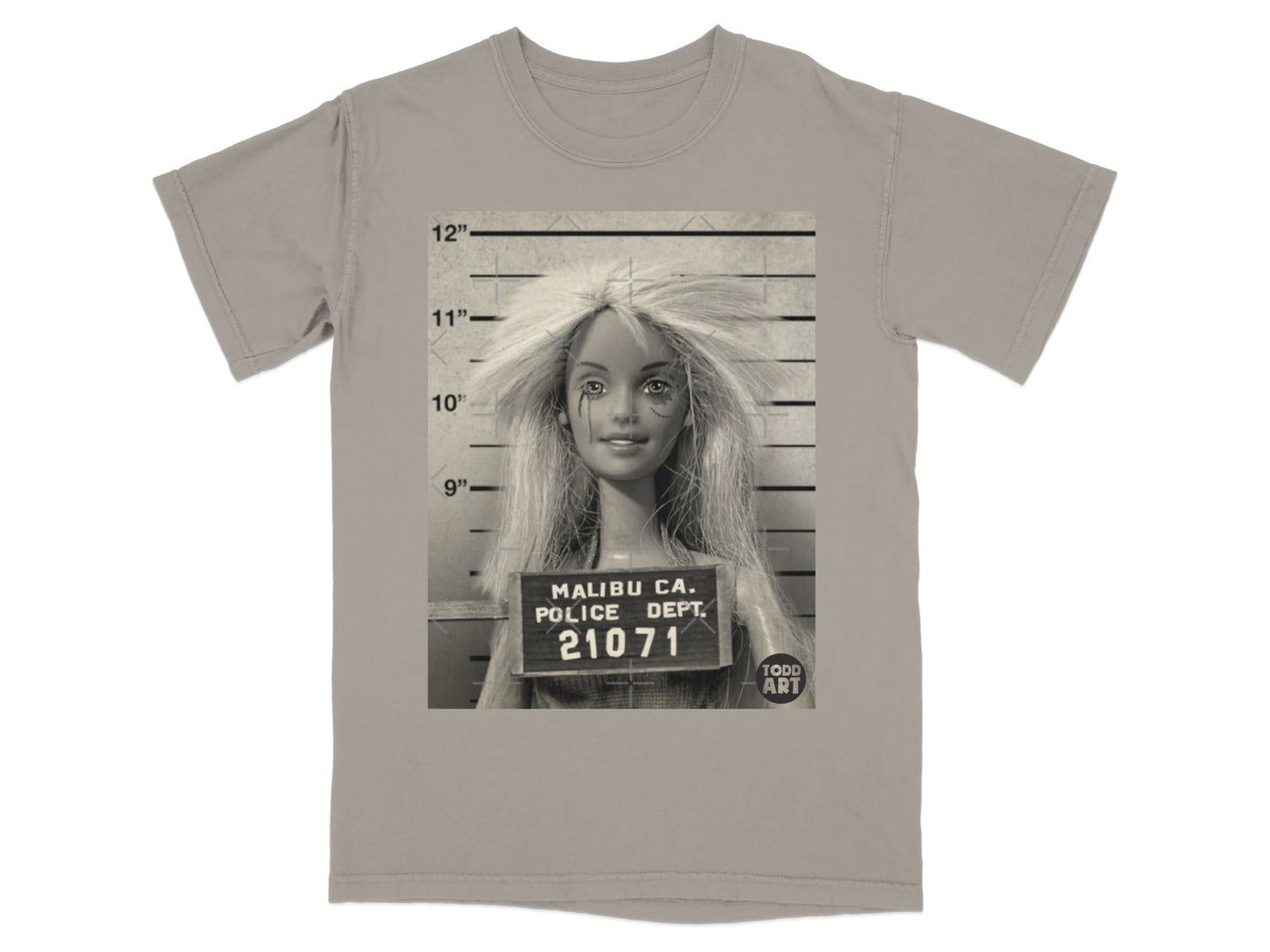 Mugshot of a doll with messy blonde hair, "Malibu Ca. Police Dept. 21071" text.