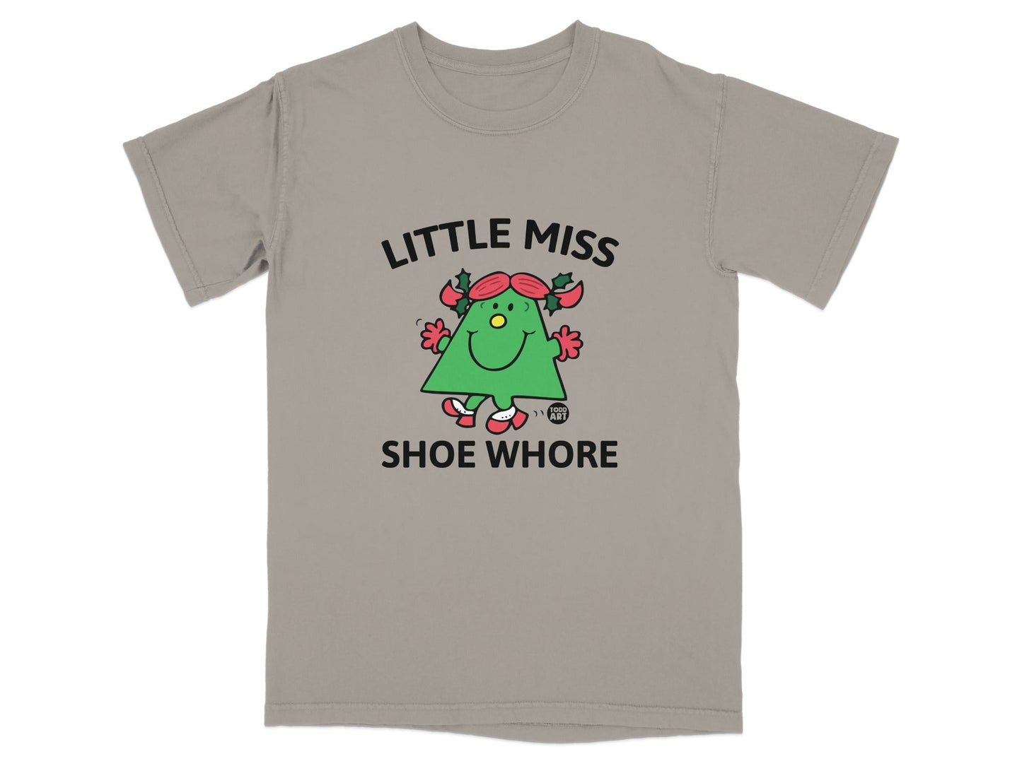 T-shirt with "Little Miss Shoe Whore" text and cartoon Christmas tree character.