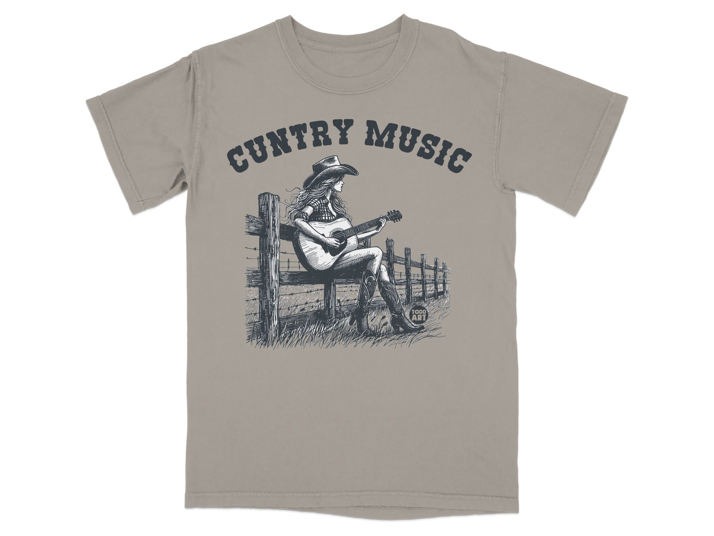T-shirt graphic with woman playing guitar at fence, text "CUNTry Music".