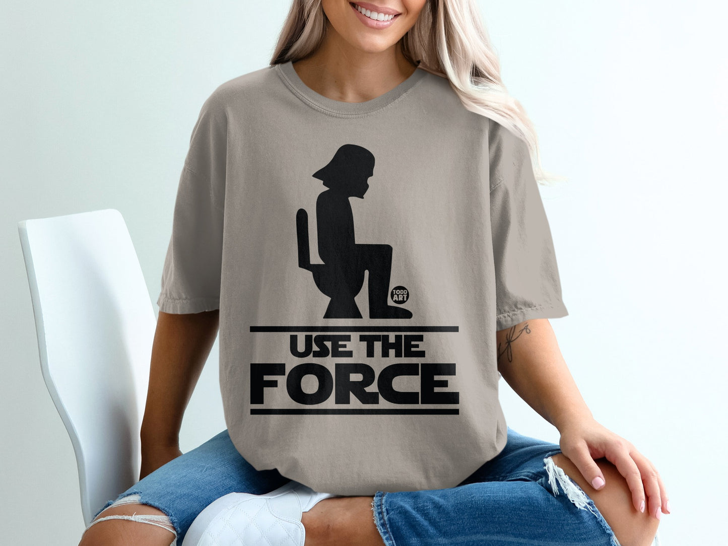 Darth Vader silhouette on a toilet with text "USE THE FORCE."