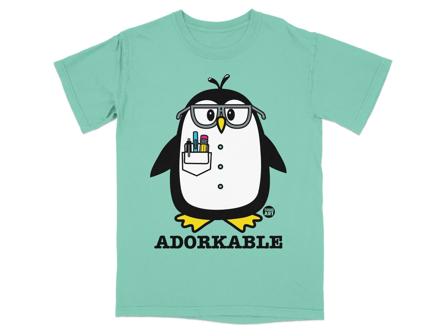 Green t-shirt with a cartoon penguin wearing glasses and holding pens.