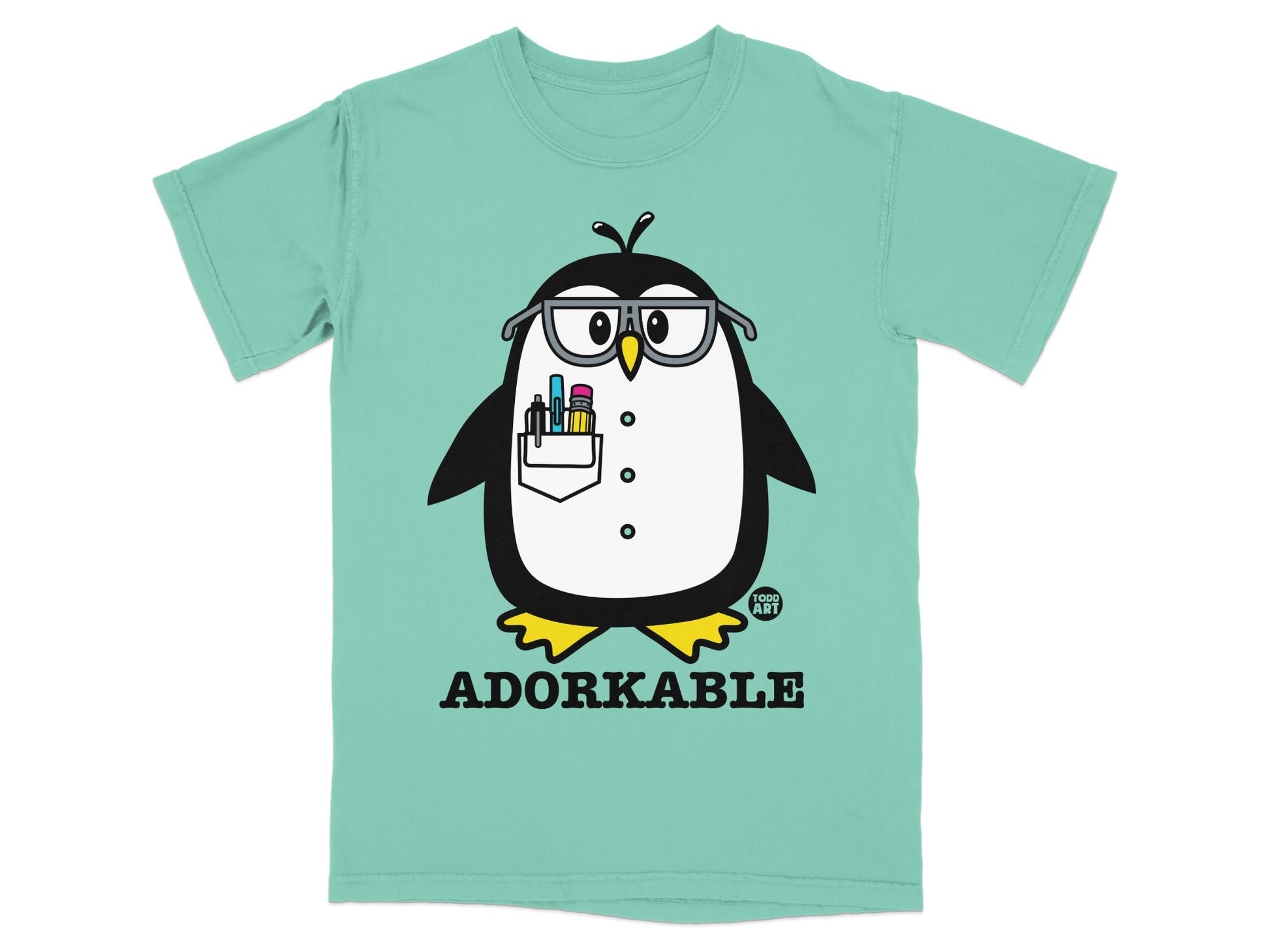 Green t-shirt with a cartoon penguin wearing glasses and holding pens.