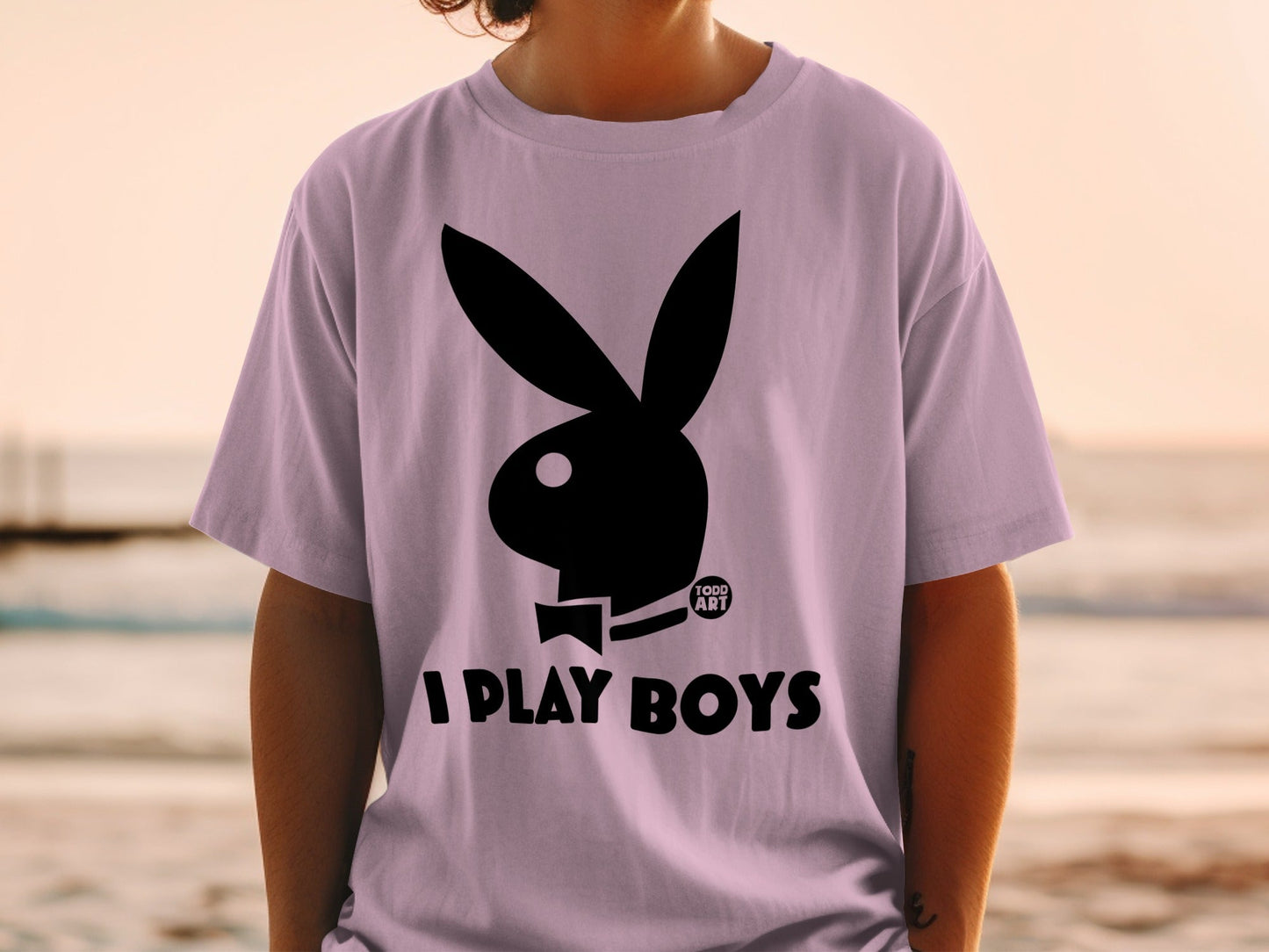 Light purple t-shirt with black Playboy bunny logo and "TODD ART I PLAY BOYS" text.