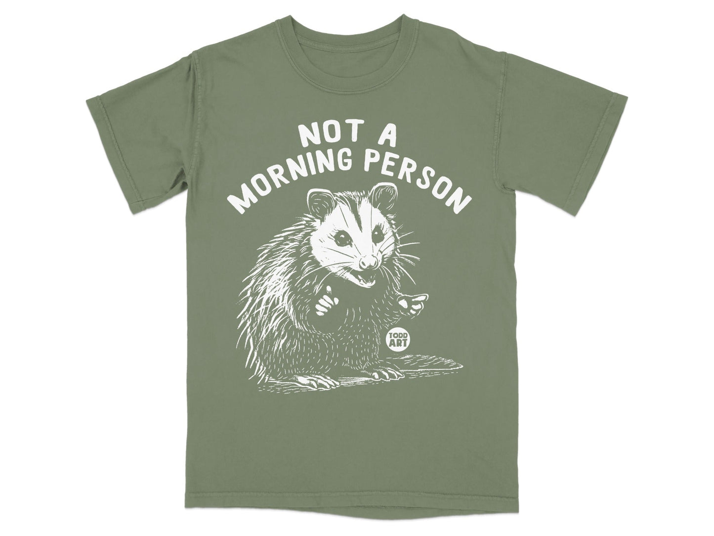 Green t-shirt with white text and opossum graphic.