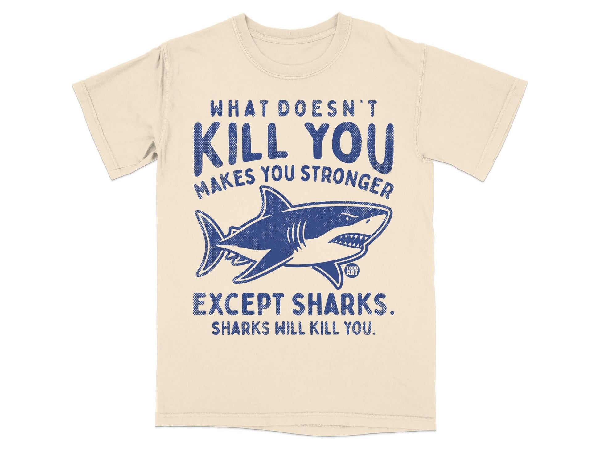 T-shirt with "What doesn't kill you makes you stronger, except sharks" and a shark illustration.