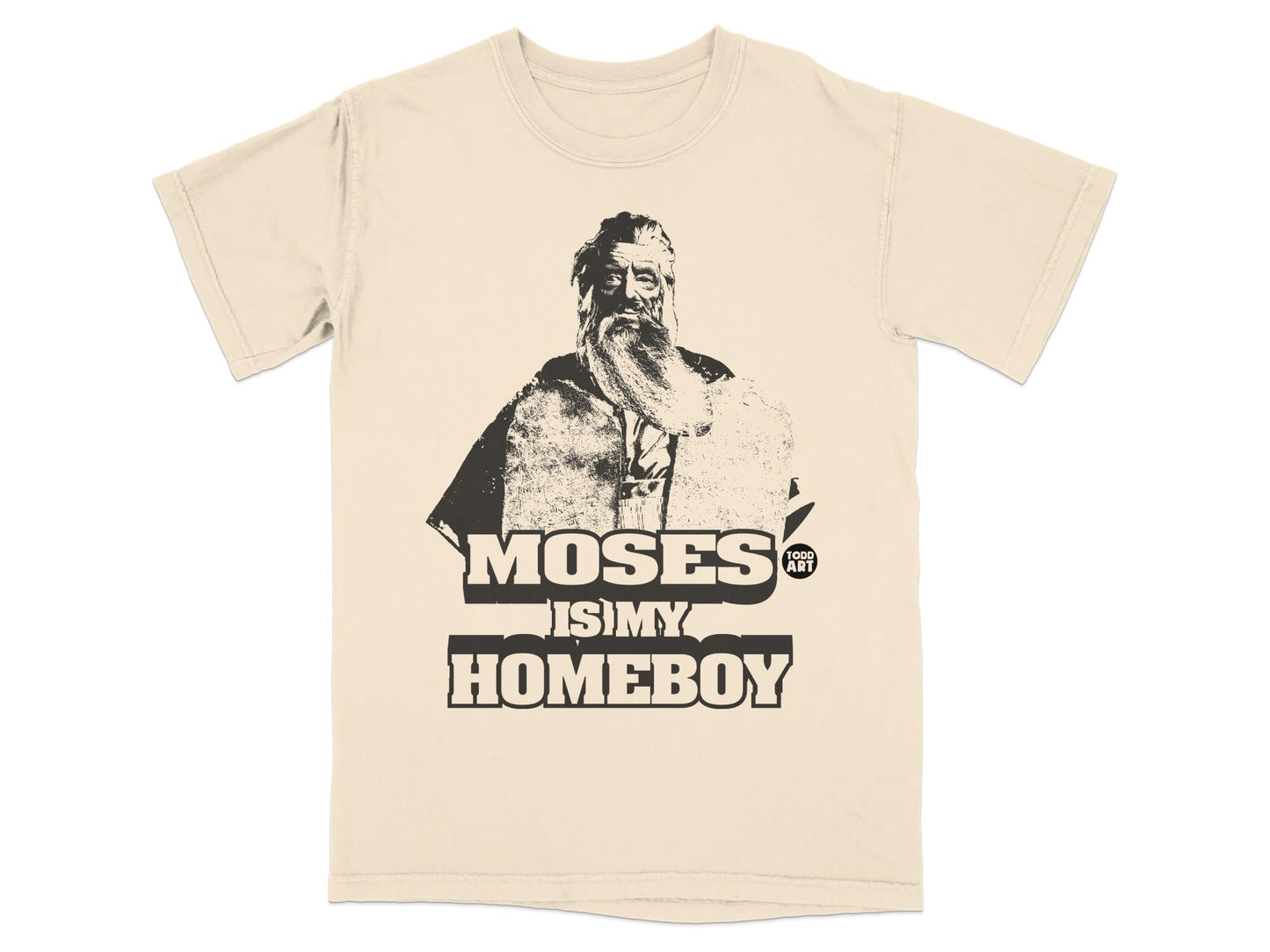 Beige t-shirt with a black graphic of Moses and text "MOSES IS MY HOMEBOY".