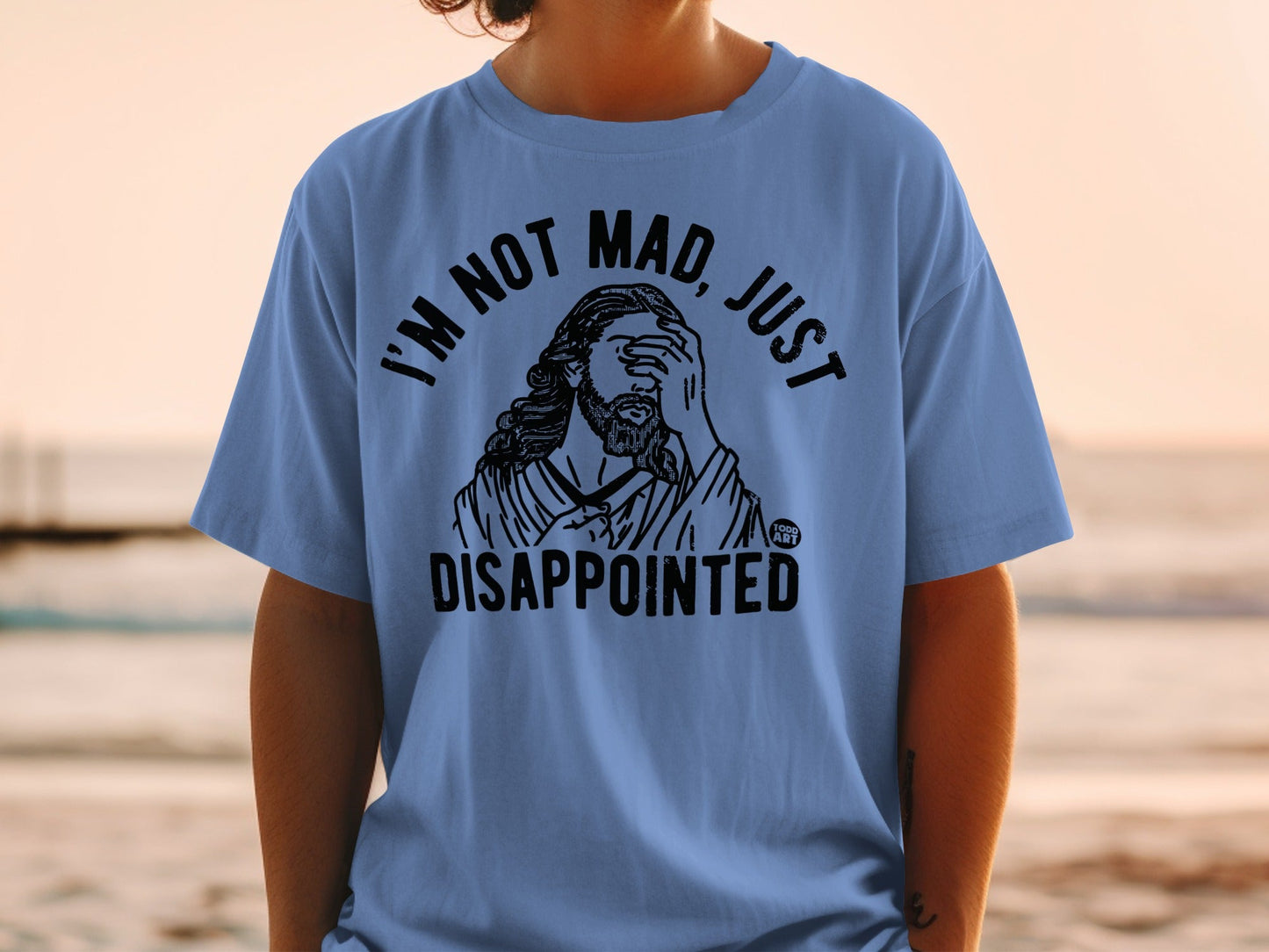 Blue t-shirt with Jesus graphic and text "I'm not mad, just disappointed".