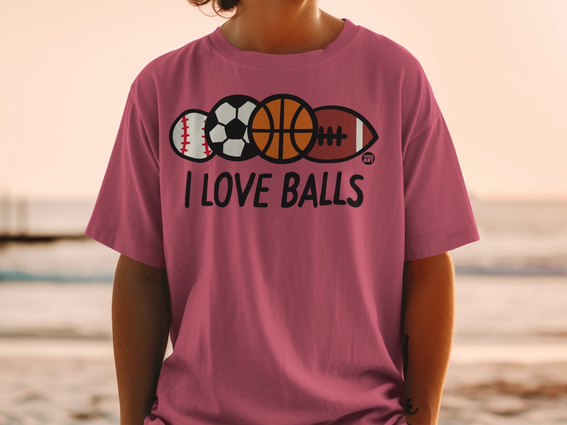 T-shirt with "I LOVE BALLS" and baseball, soccer, basketball, and football icons.