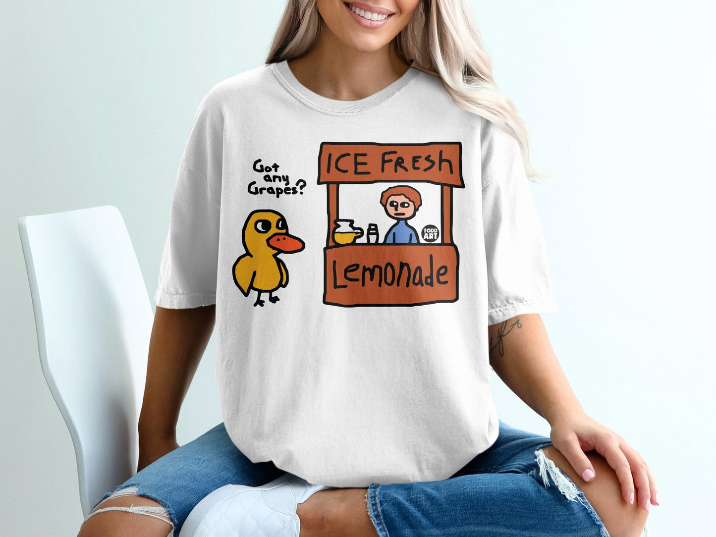 Duck at an ice-cold lemonade stand with "Got Grapes?" text.