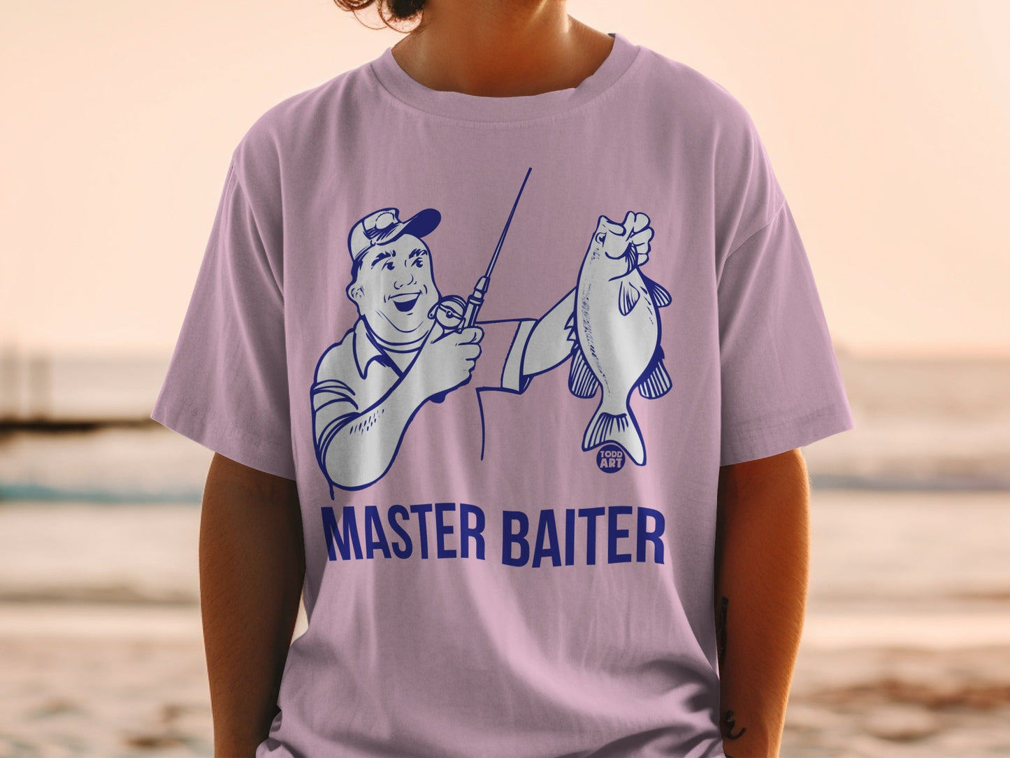 Illustration of a man holding a fish, wearing a "MASTER BAITER" t-shirt.