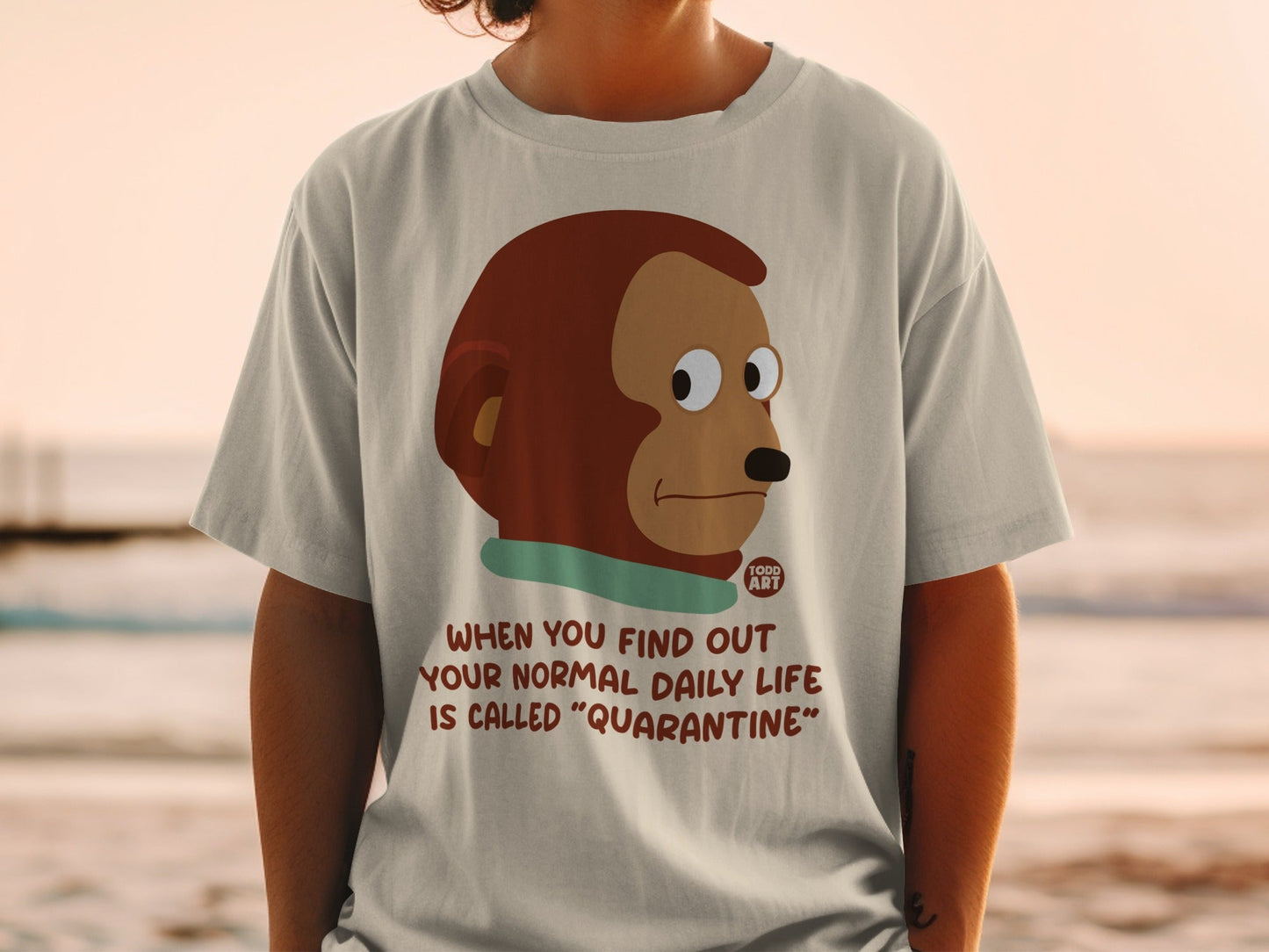 T-shirt with cartoon monkey and "Quarantine" text.