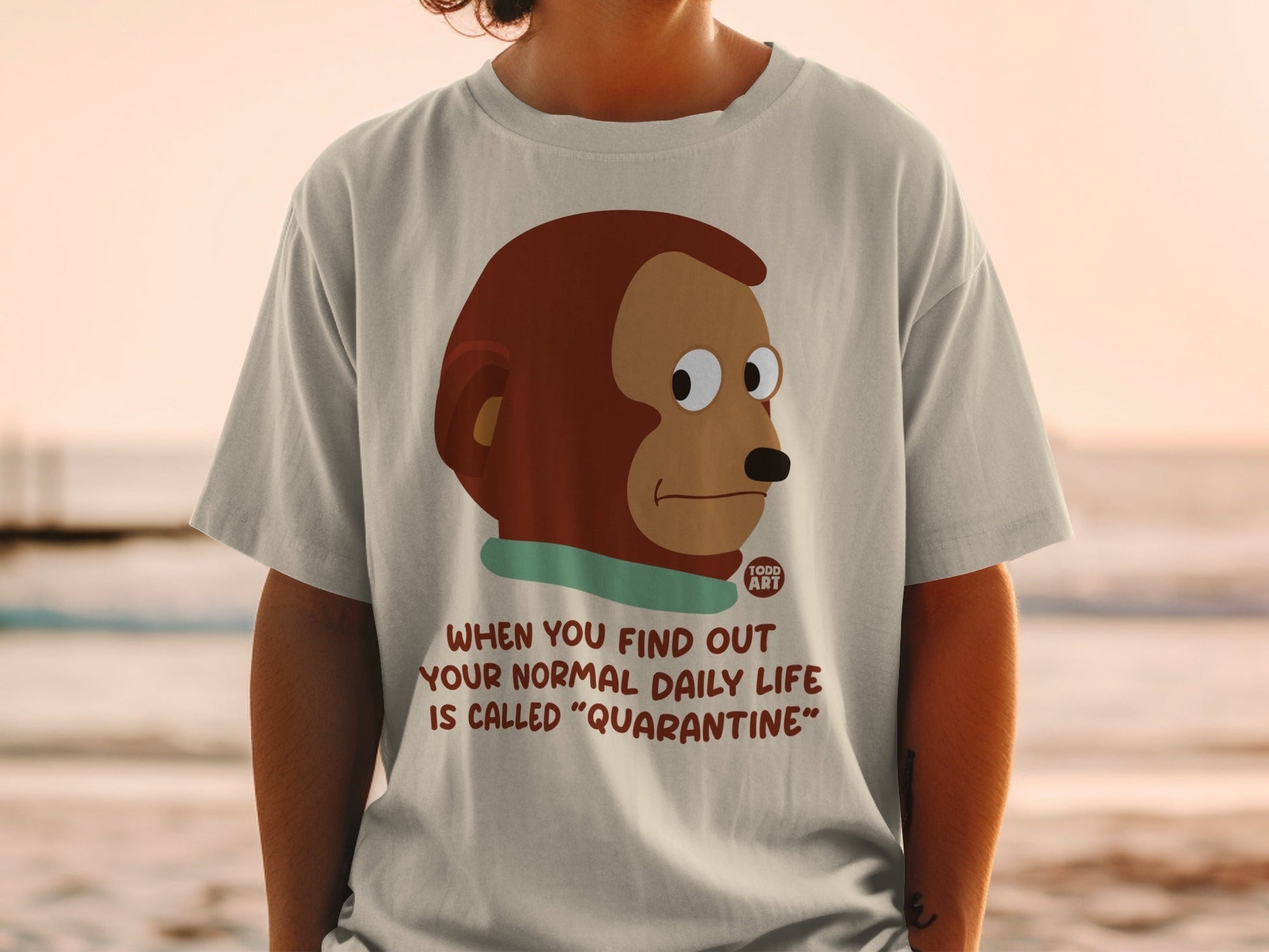T-shirt with cartoon monkey and "Quarantine" text.