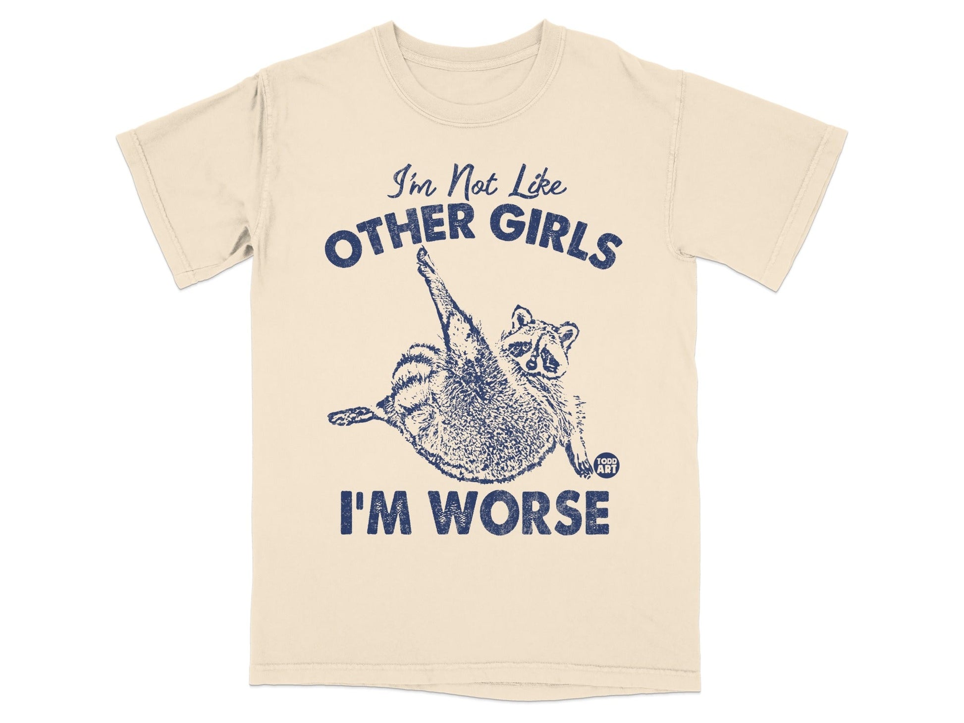 Cream t-shirt with distressed raccoon graphic and text "I'm Not Like OTHER GIRLS I'M WORSE".
