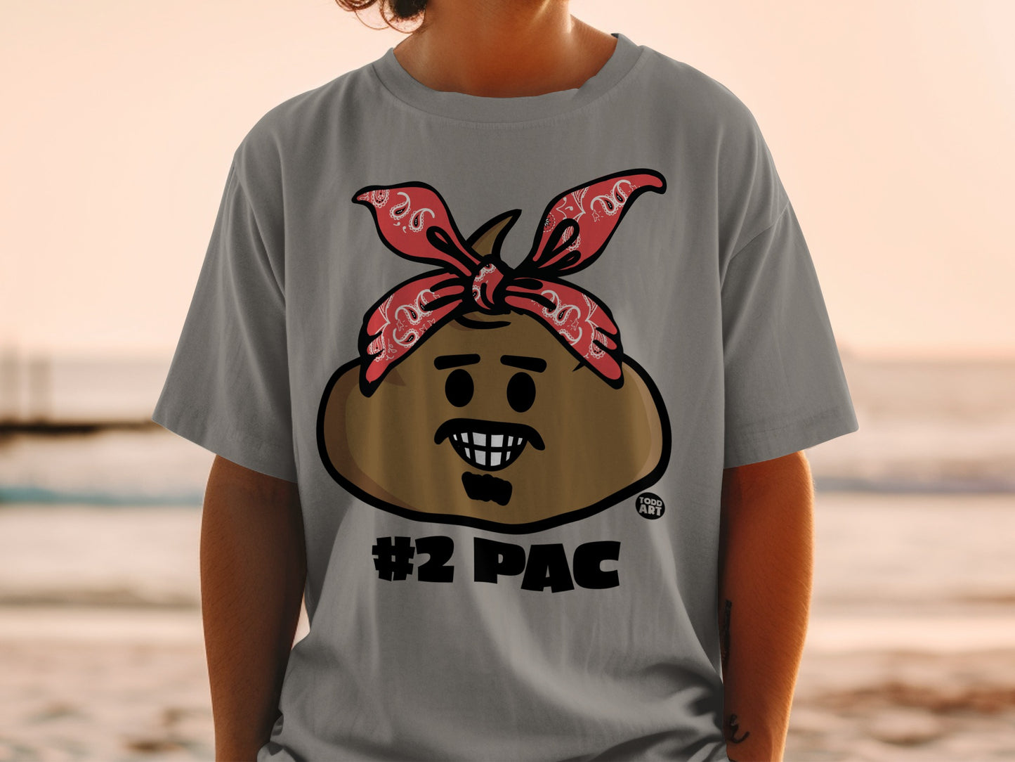 Cartoon character with bandana and #2 PAC text on a grey t-shirt.