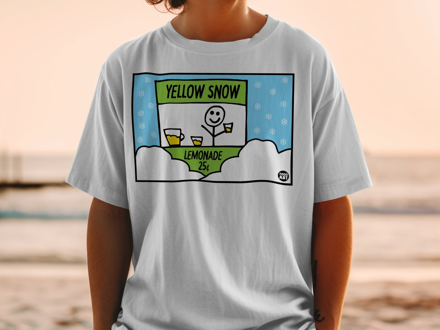 T-shirt featuring a cartoon of a smiling person selling lemonade for 25 cents.