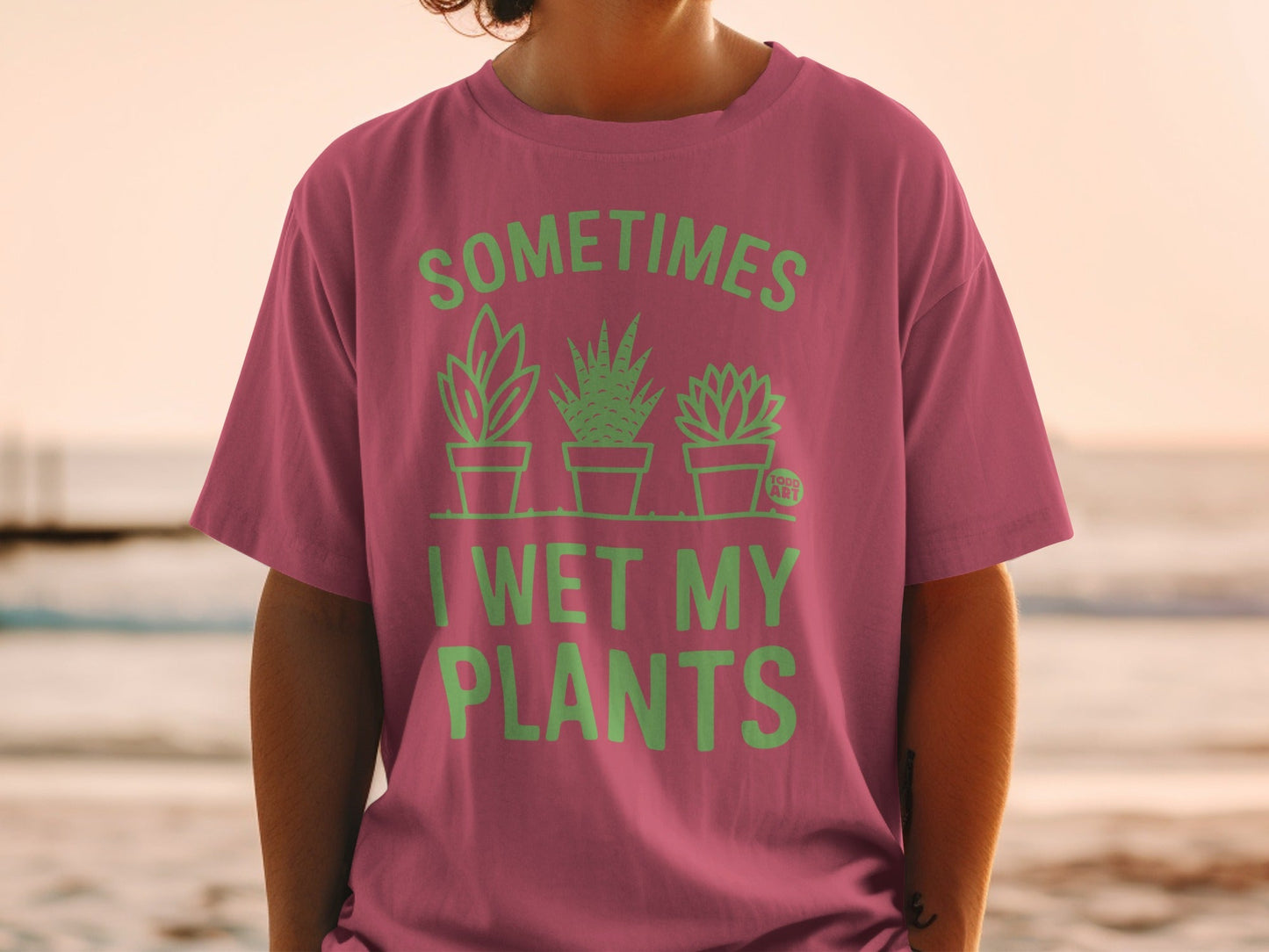T-shirt with "Sometimes I Wet My Plants" and three potted plants.