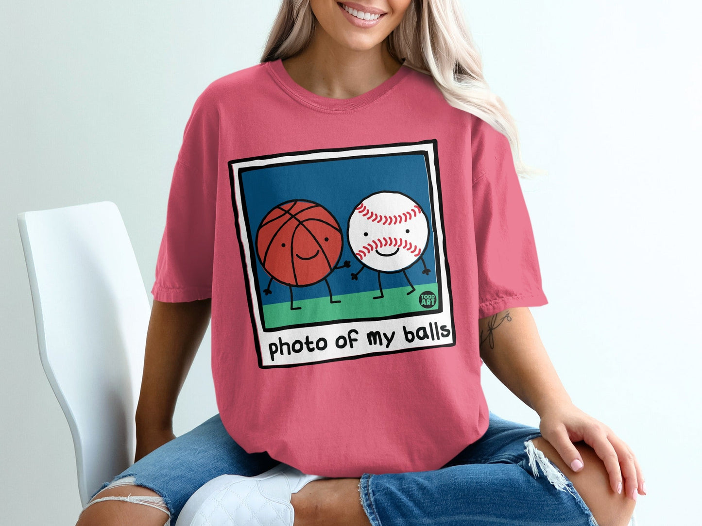 Cartoon basketball and baseball holding hands with text "photo of my balls".