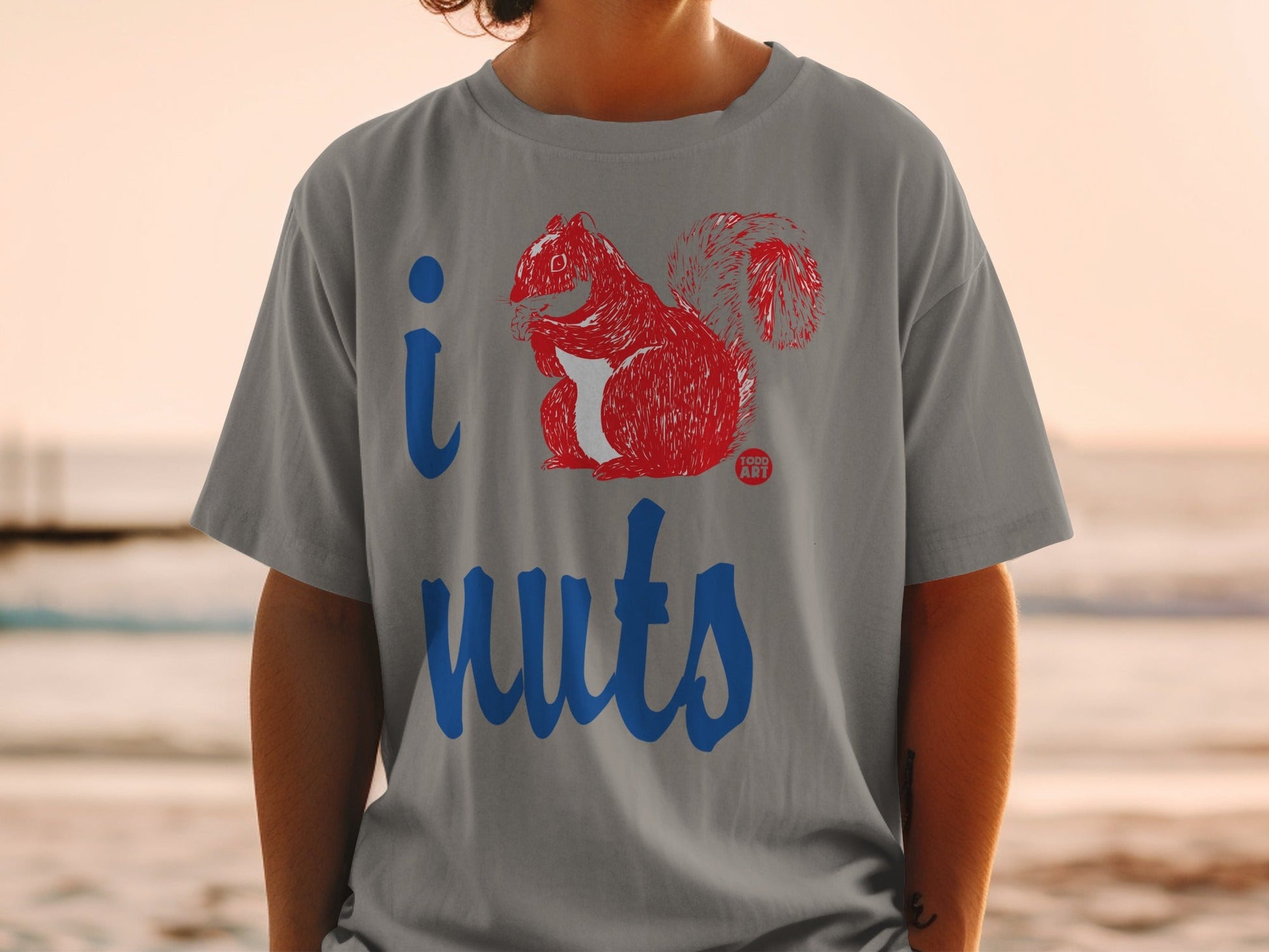 Gray t-shirt with "I love nuts" text and a red squirrel illustration.