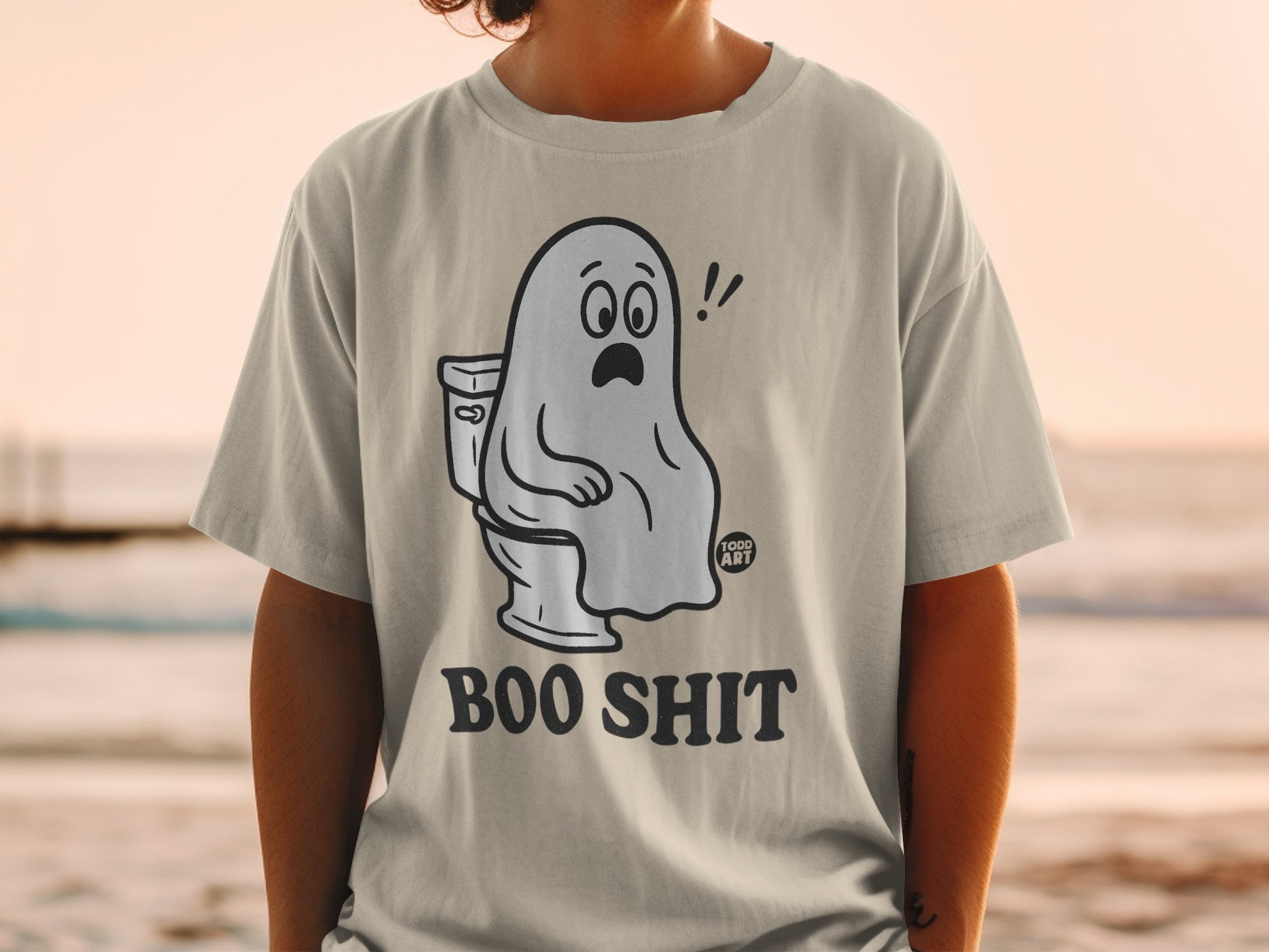 Ghost sitting on a toilet with "Boo Shit" text.