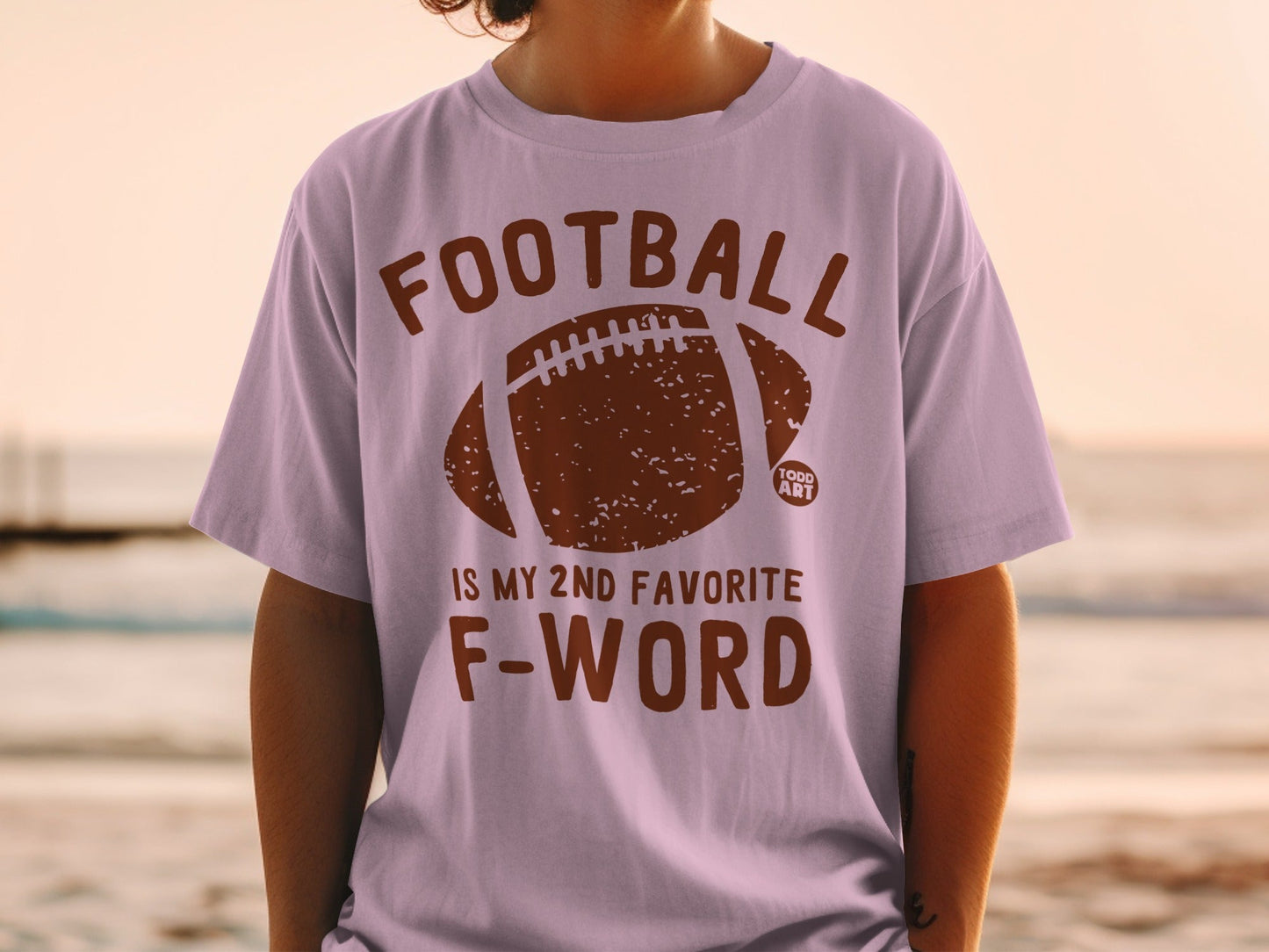 Light purple t-shirt with "FOOTBALL IS MY 2ND FAVORITE F-WORD" and football graphic.