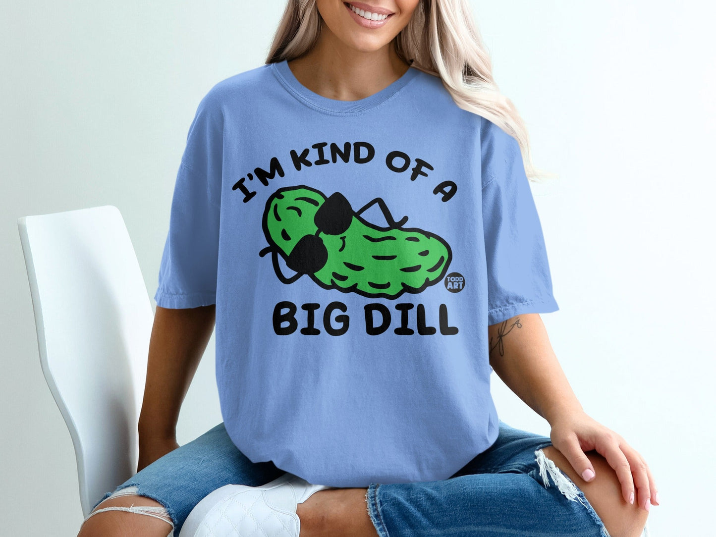 T-shirt with cartoon pickle wearing sunglasses and text "I'm kind of a big dill".
