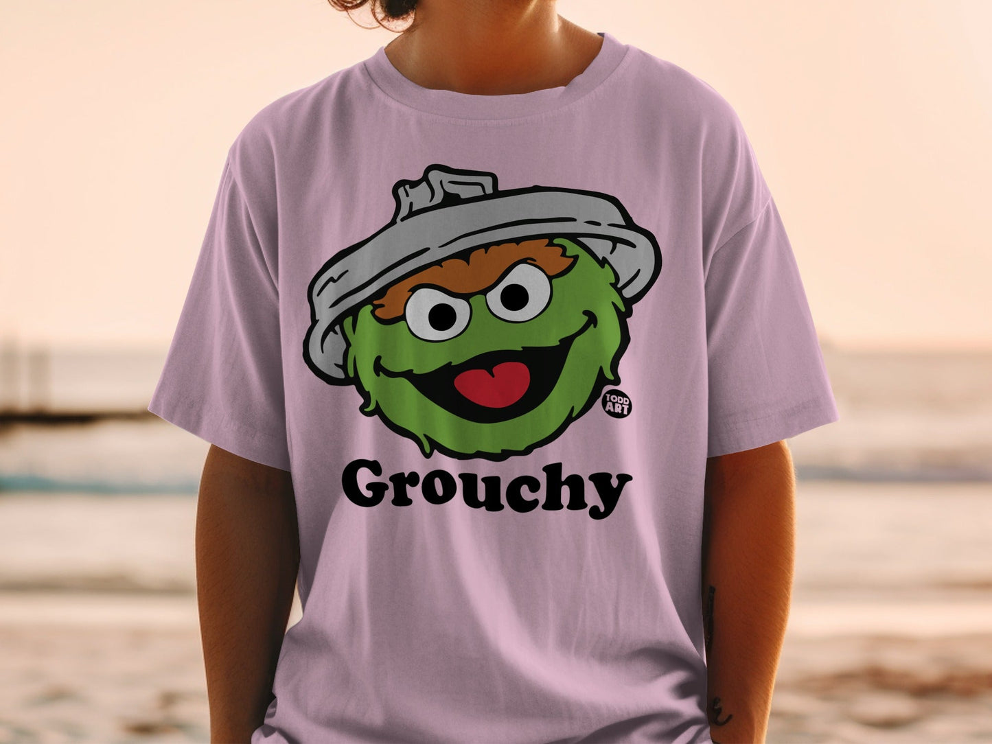 Purple t-shirt with Oscar the Grouch character and "Grouchy" text.