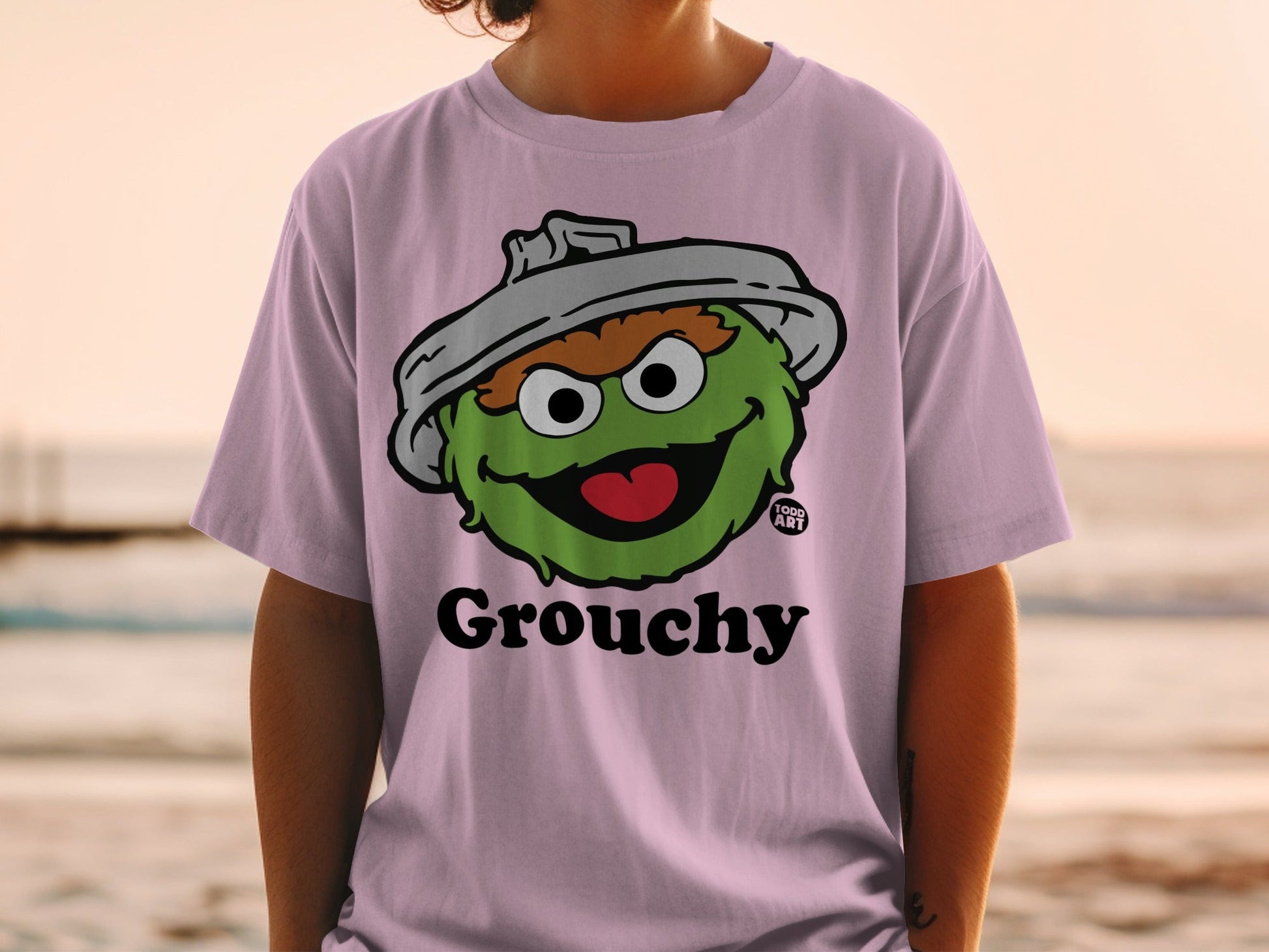 Purple t-shirt with Oscar the Grouch character and "Grouchy" text.