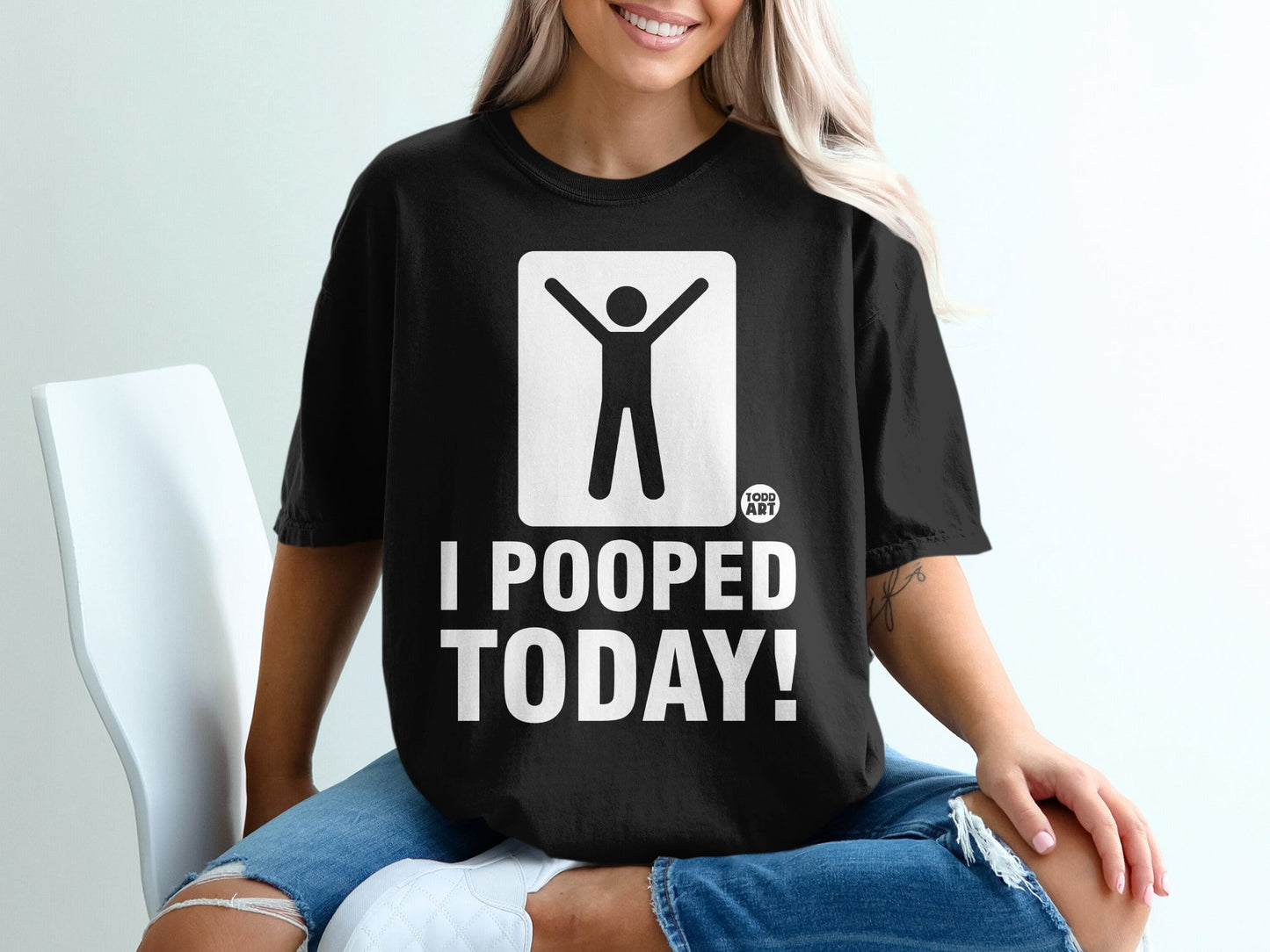 Black t-shirt with white text "I POOPED TODAY!" and stick figure.