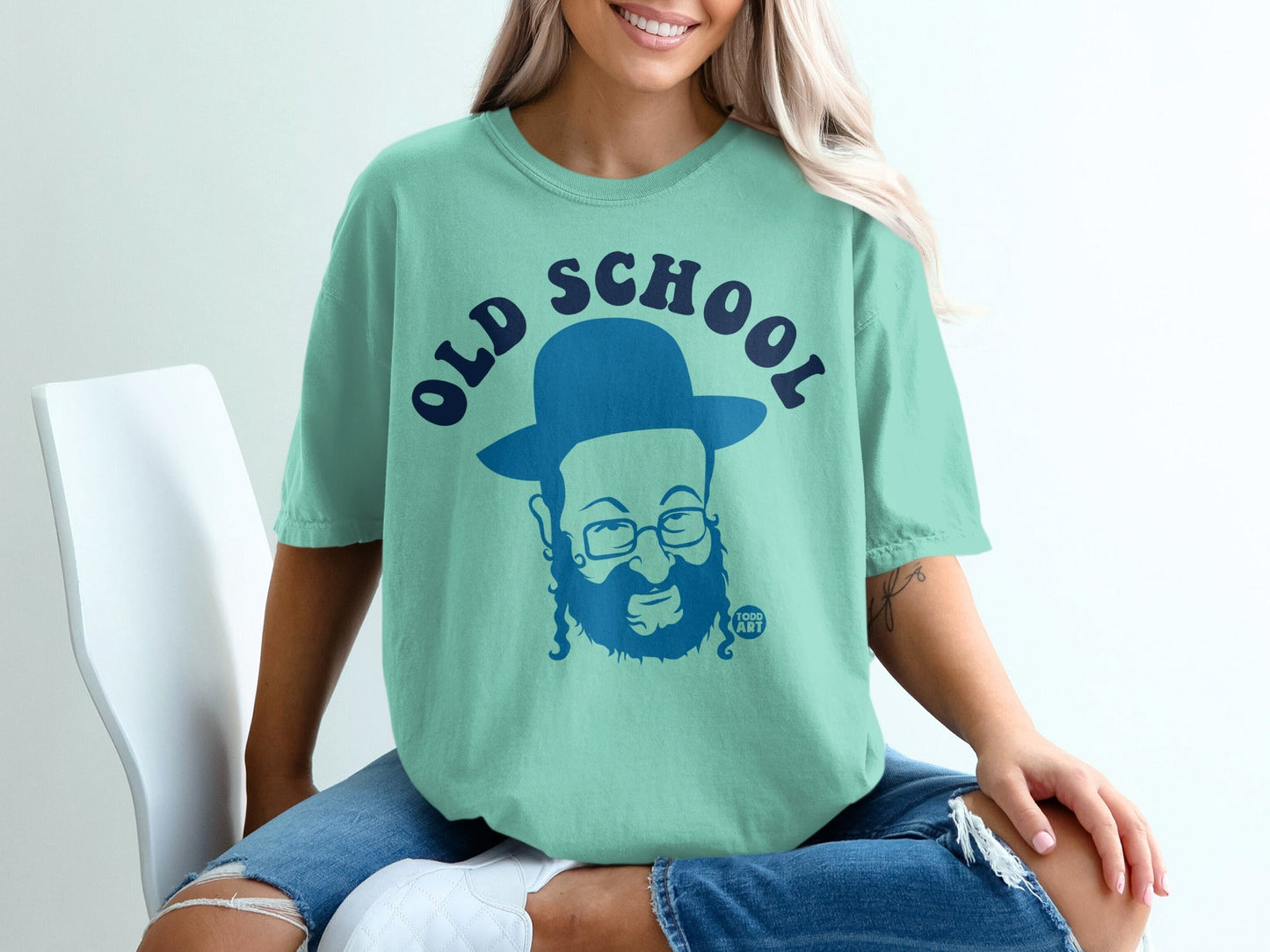 Teal t-shirt with "Old School" text and cartoon drawing of a bearded man.