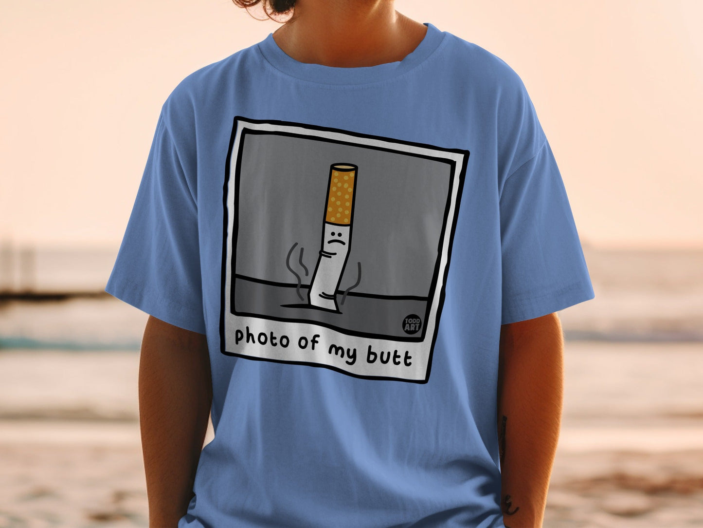T-shirt with cartoon cigarette butt saying "photo of my butt."