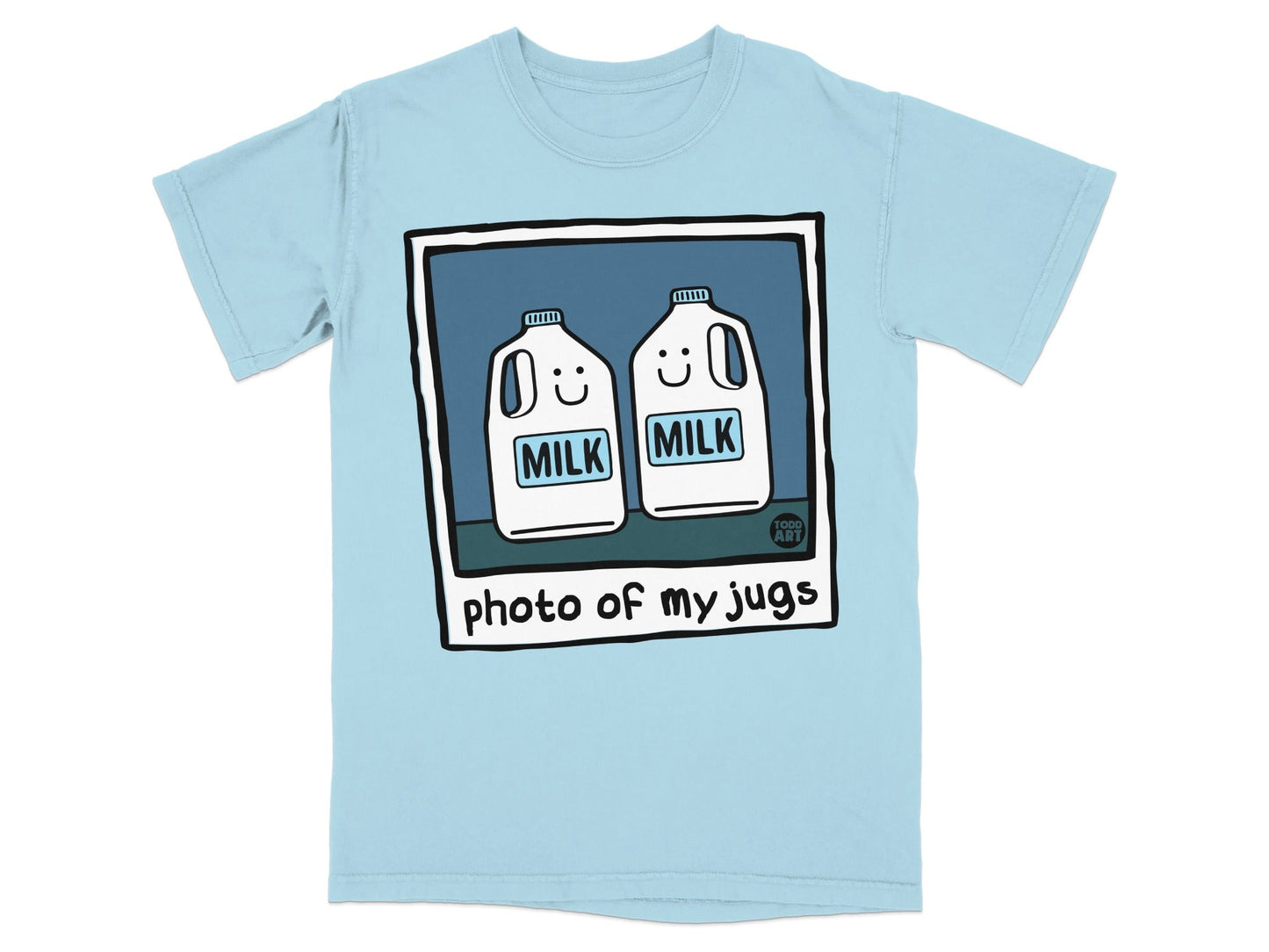 Light blue t-shirt with cartoon jugs of milk that say "MILK".