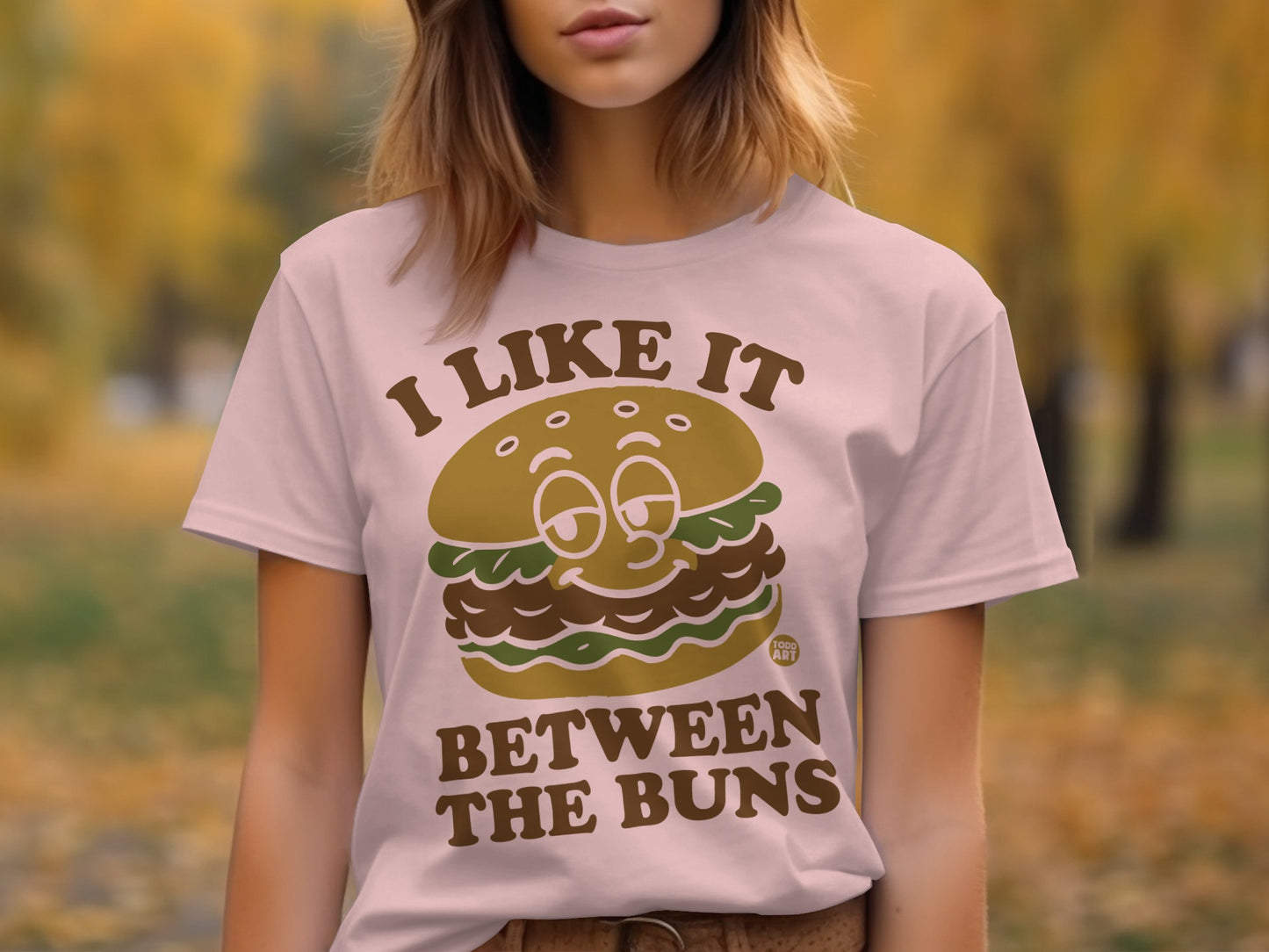 I Like It Between The Buns Funny Burger Graphic T-Shirt