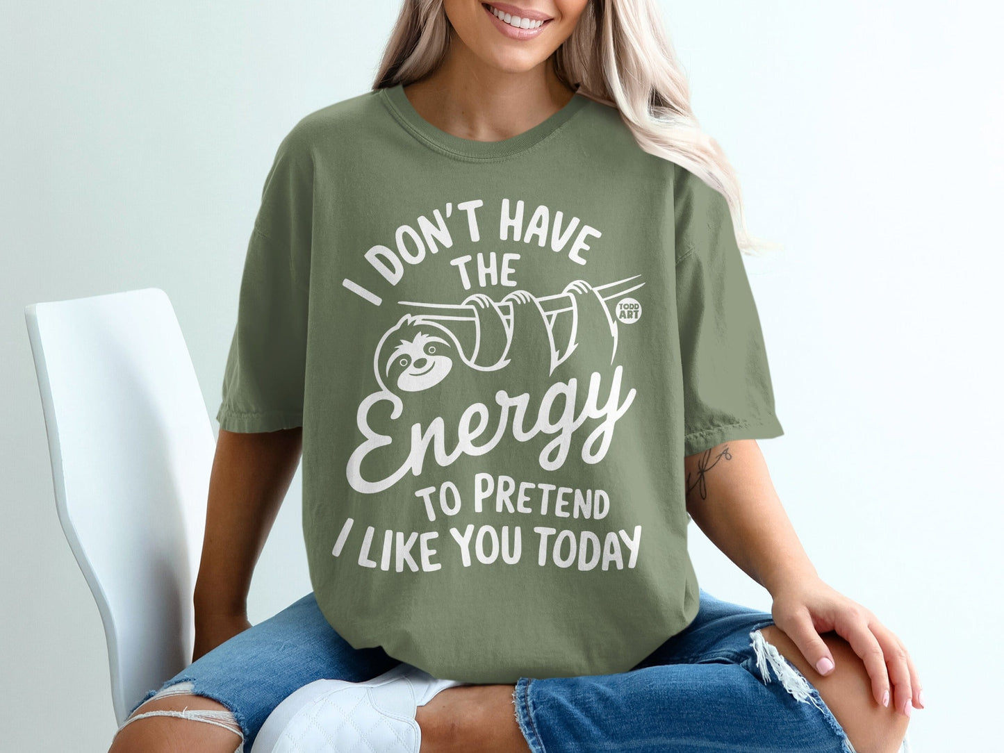 Olive t-shirt with white text: "I don't have the energy to pretend I like you today."
