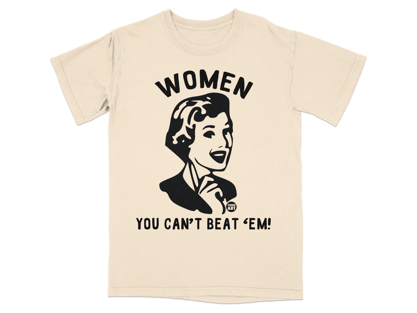 Cream t-shirt with graphic of woman and text "WOMEN YOU CAN'T BEAT 'EM!"