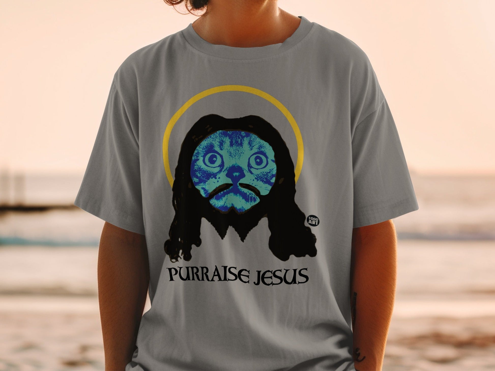 Purrraise Jesus Graphic Tee with Cat and Halo Design
