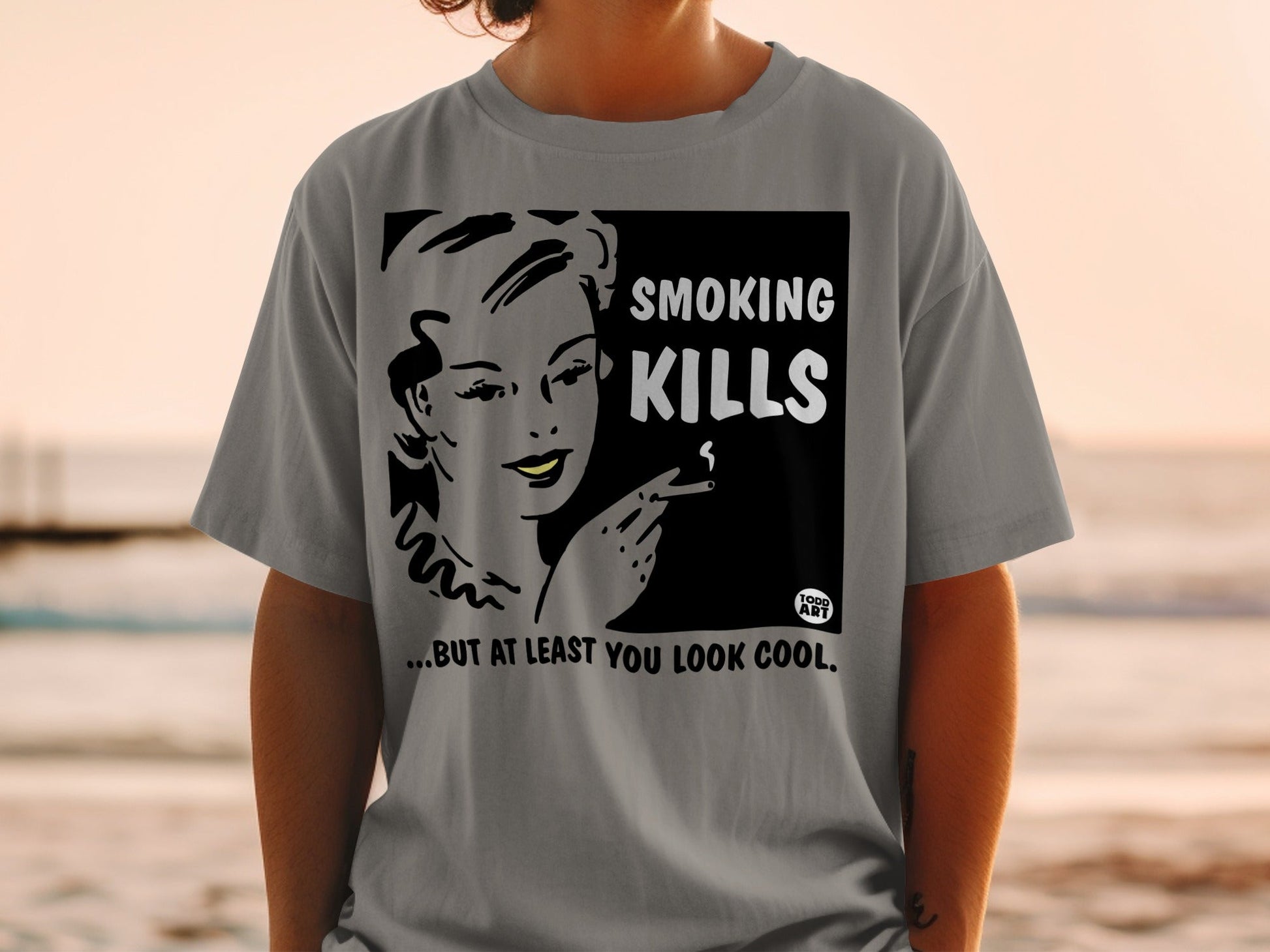 T-shirt with "SMOKING KILLS...BUT AT LEAST YOU LOOK COOL" text and retro woman.