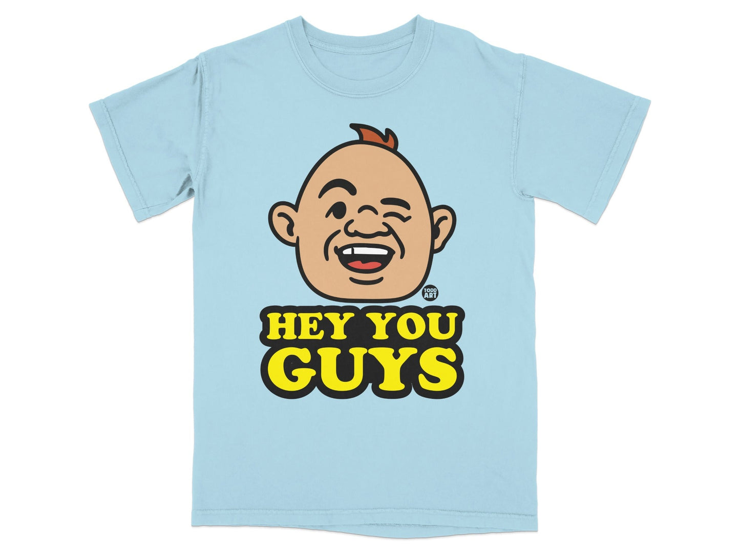 Light blue t-shirt with cartoon character winking and text "HEY YOU GUYS".