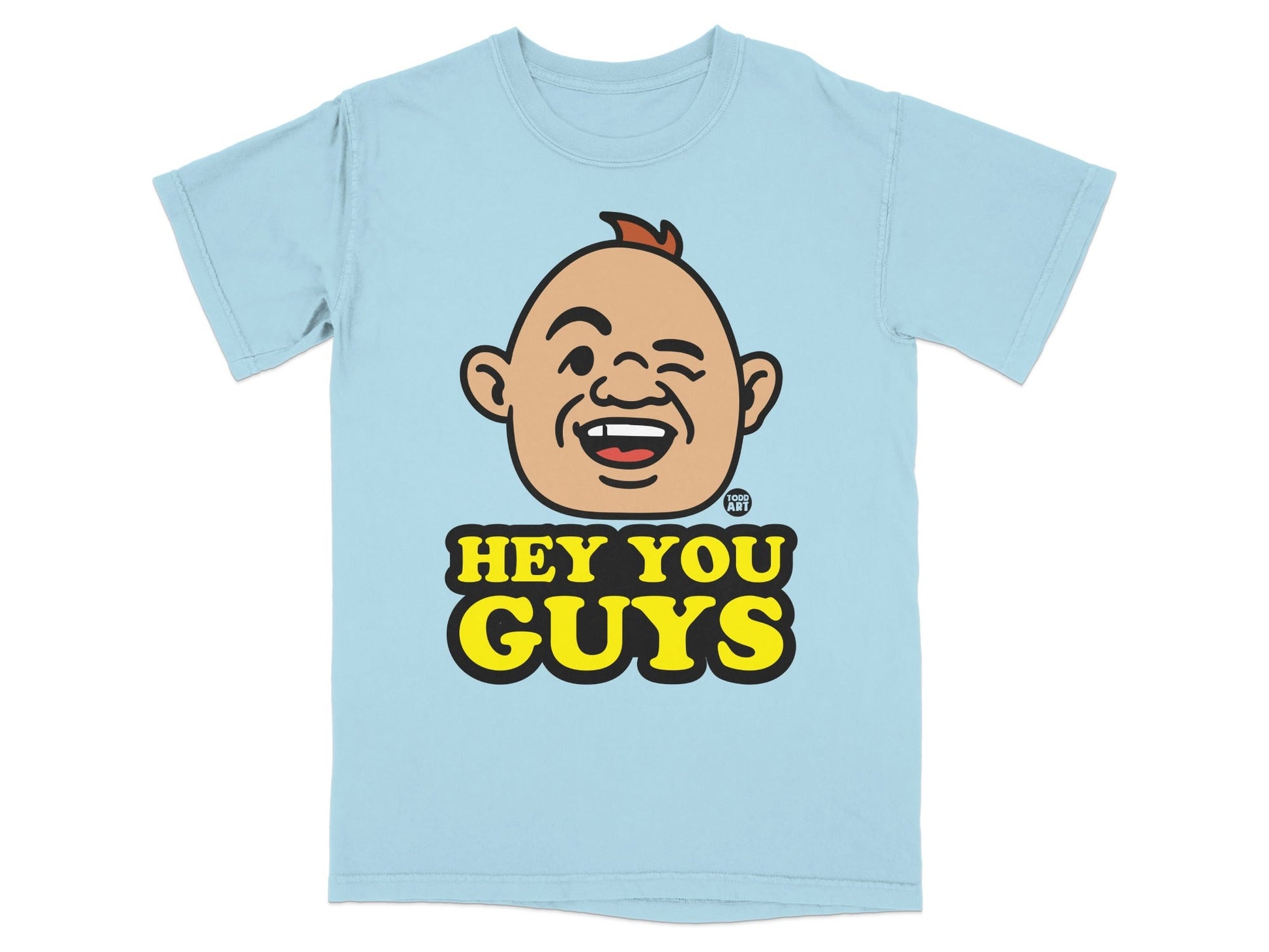 Light blue t-shirt with cartoon character winking and text "HEY YOU GUYS".