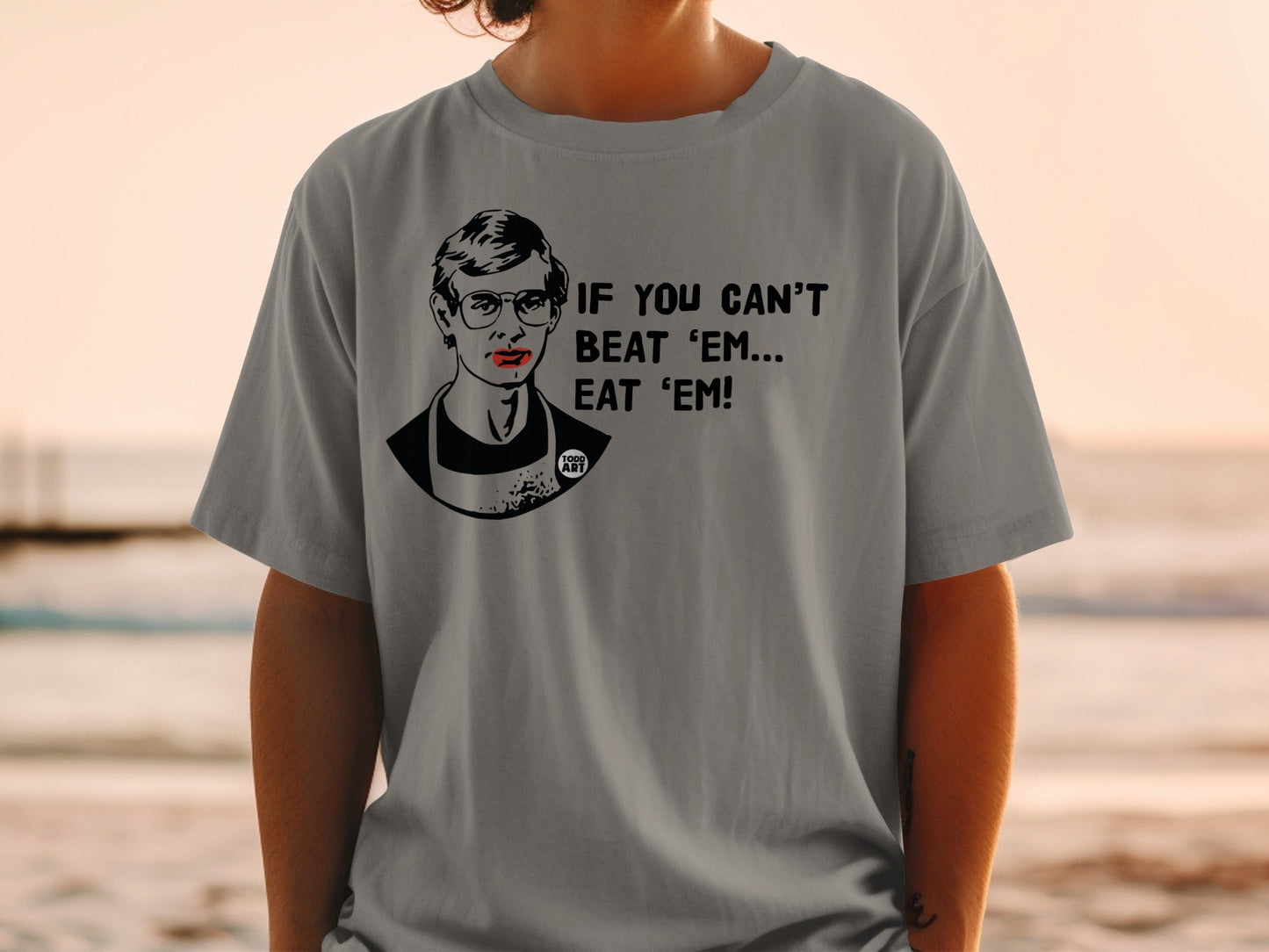 T-shirt with portrait and text "IF YOU CAN'T BEAT 'EM... EAT 'EM!"