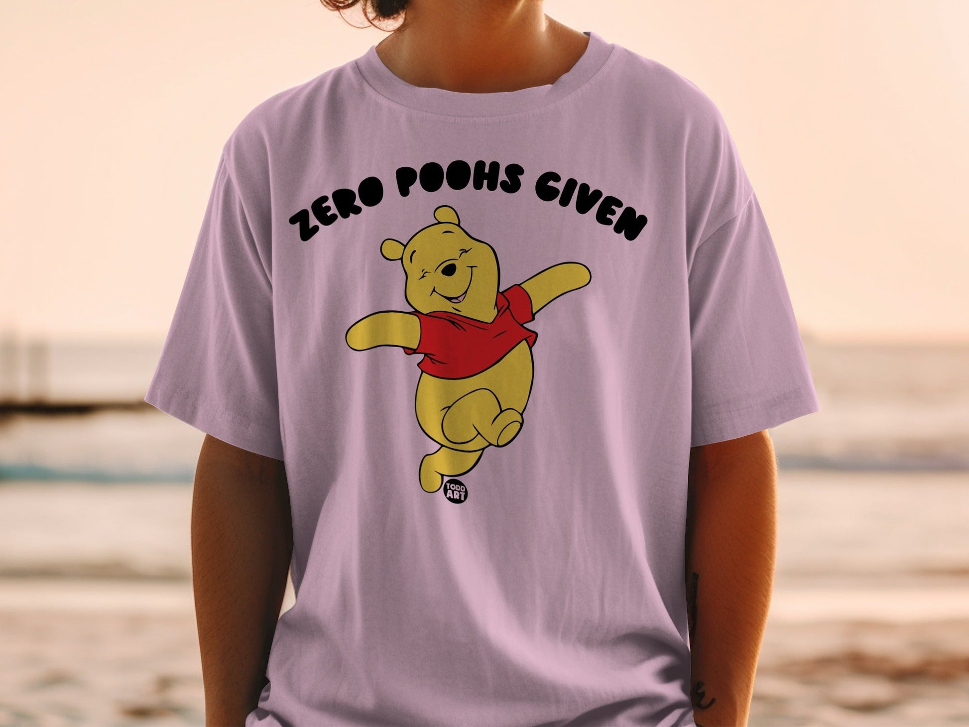 Winnie the Pooh wearing a red shirt with "ZERO POOHS GIVEN" text.