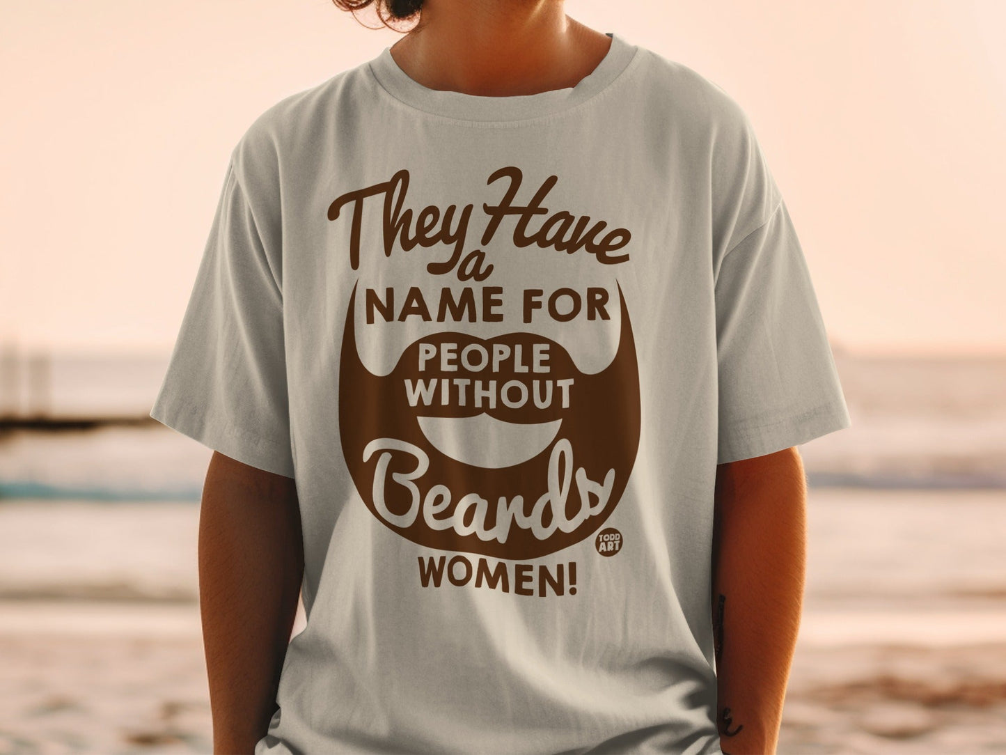 Brown t-shirt with white text "They Have Name For People Without Beards WOMEN!"