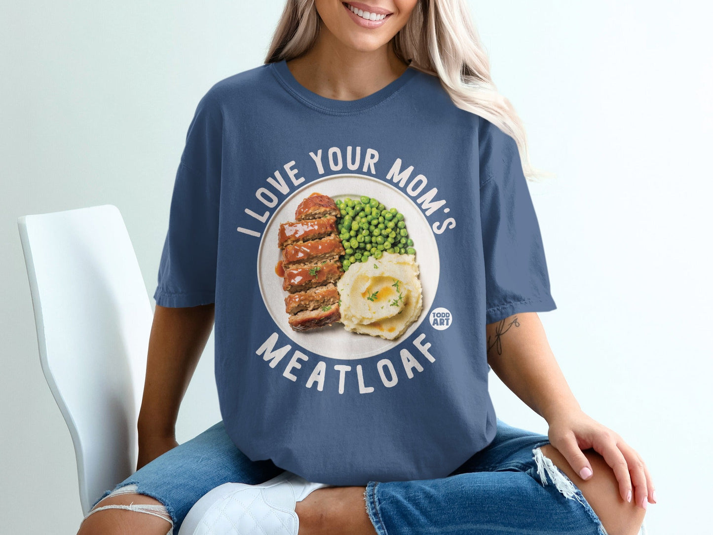Blue t-shirt with text "I LOVE YOUR MOM'S MEATLOAF" and a picture of meatloaf.