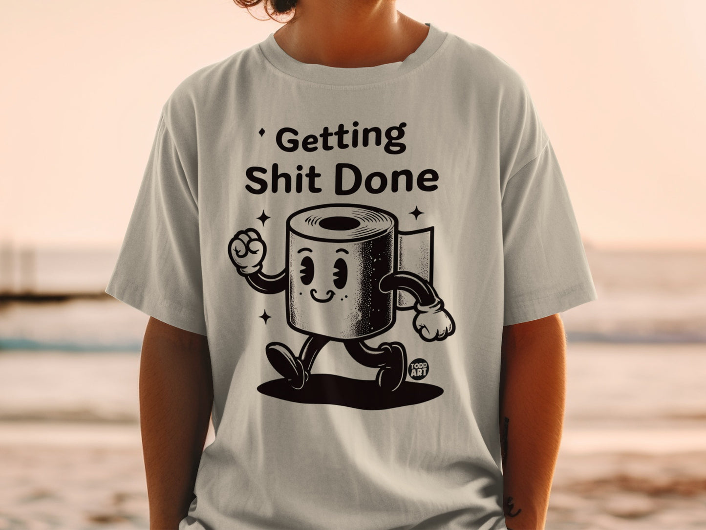T-shirt with cartoon toilet paper character and text "Getting Shit Done".