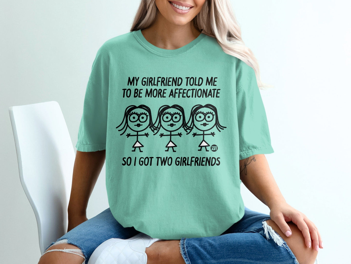T-shirt with cartoon girls and text "My girlfriend told me to be more affectionate so I got two girlfriends."