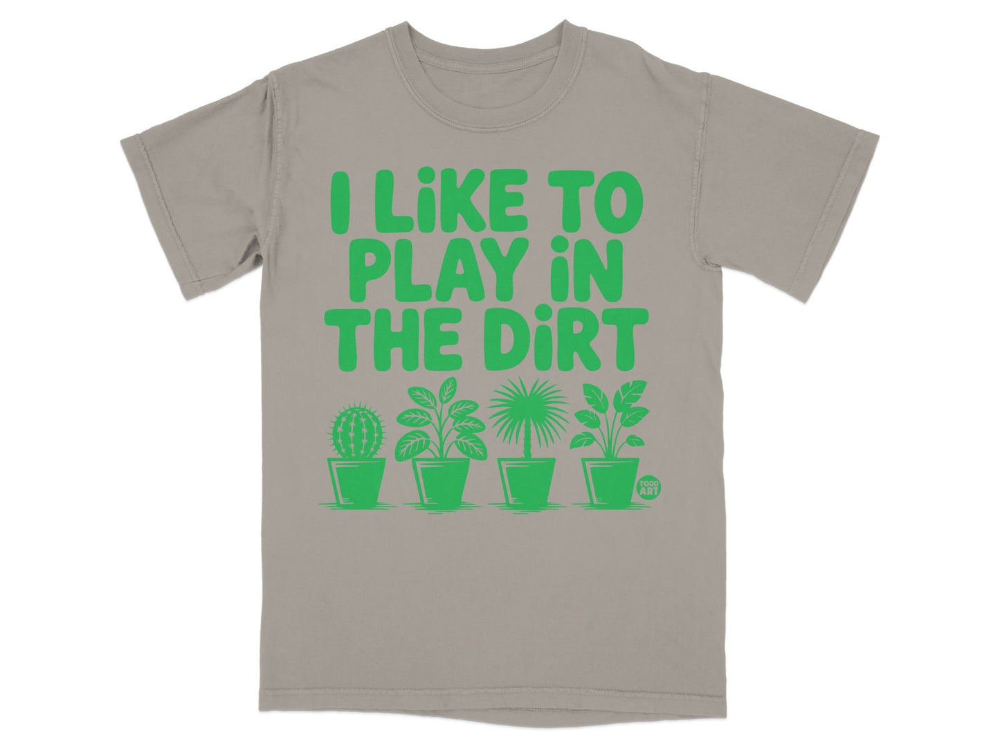 Gray t-shirt with green text "I LIKE TO PLAY IN THE DIRT" and potted plants.