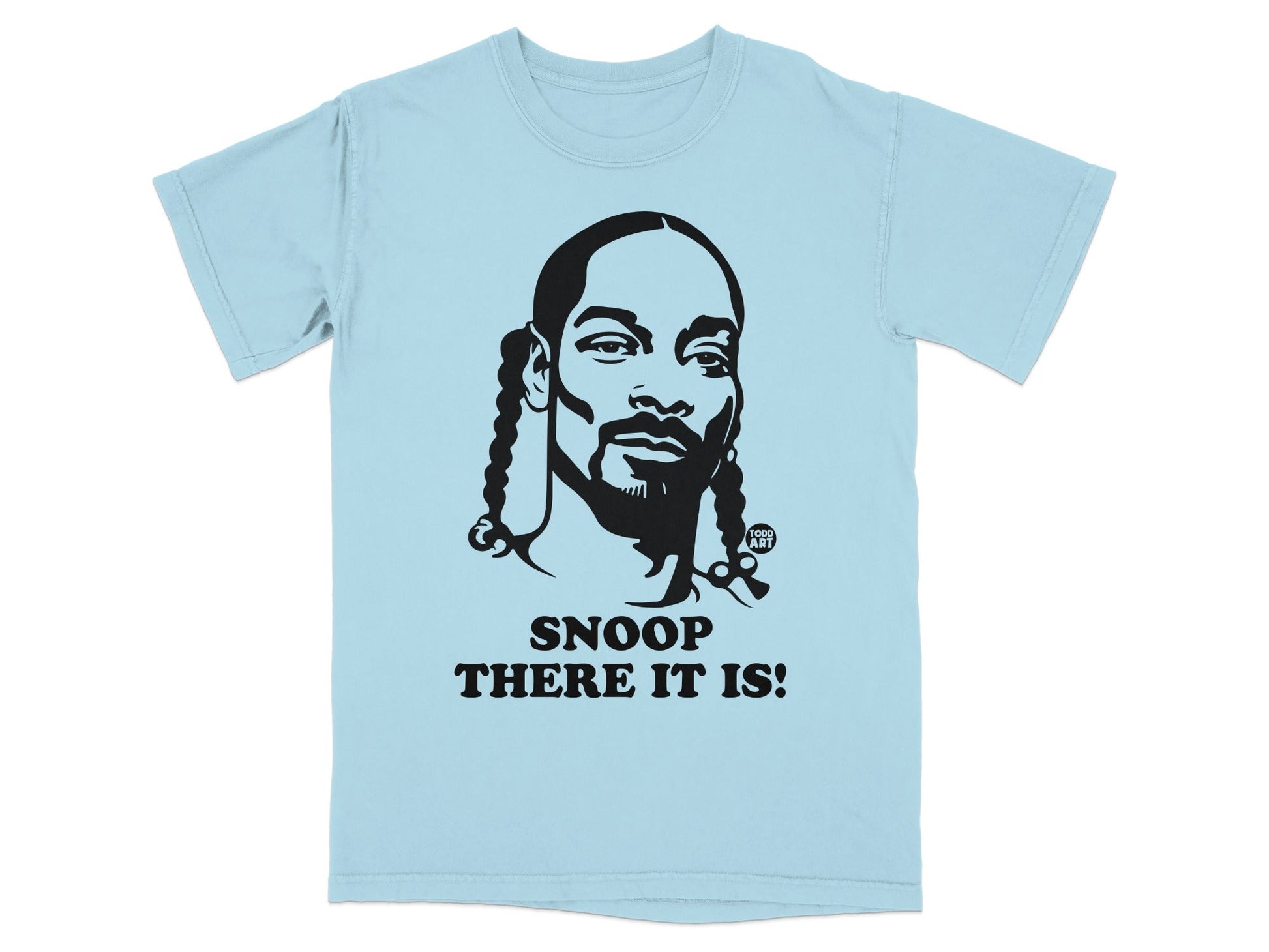 Light blue t-shirt with black graphic of Snoop Dogg's face and text "SNOOP THERE IT IS!".
