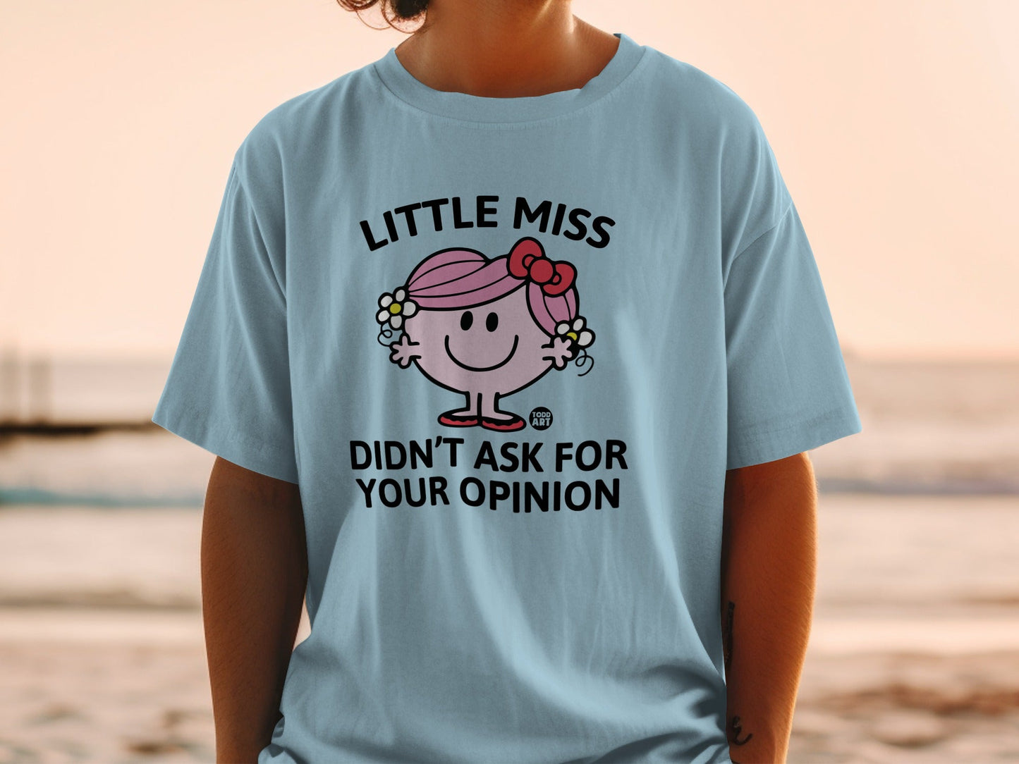 Light blue t-shirt featuring "Little Miss Didn't Ask For Your Opinion" graphic.