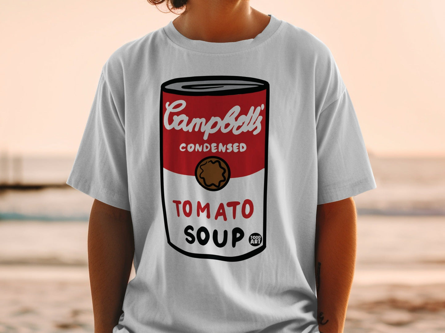 White t-shirt with Campbell's Condensed Tomato Soup can graphic.